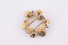 Eccezionale spilla con diamanti e zaffiri H. Stern 18 carati