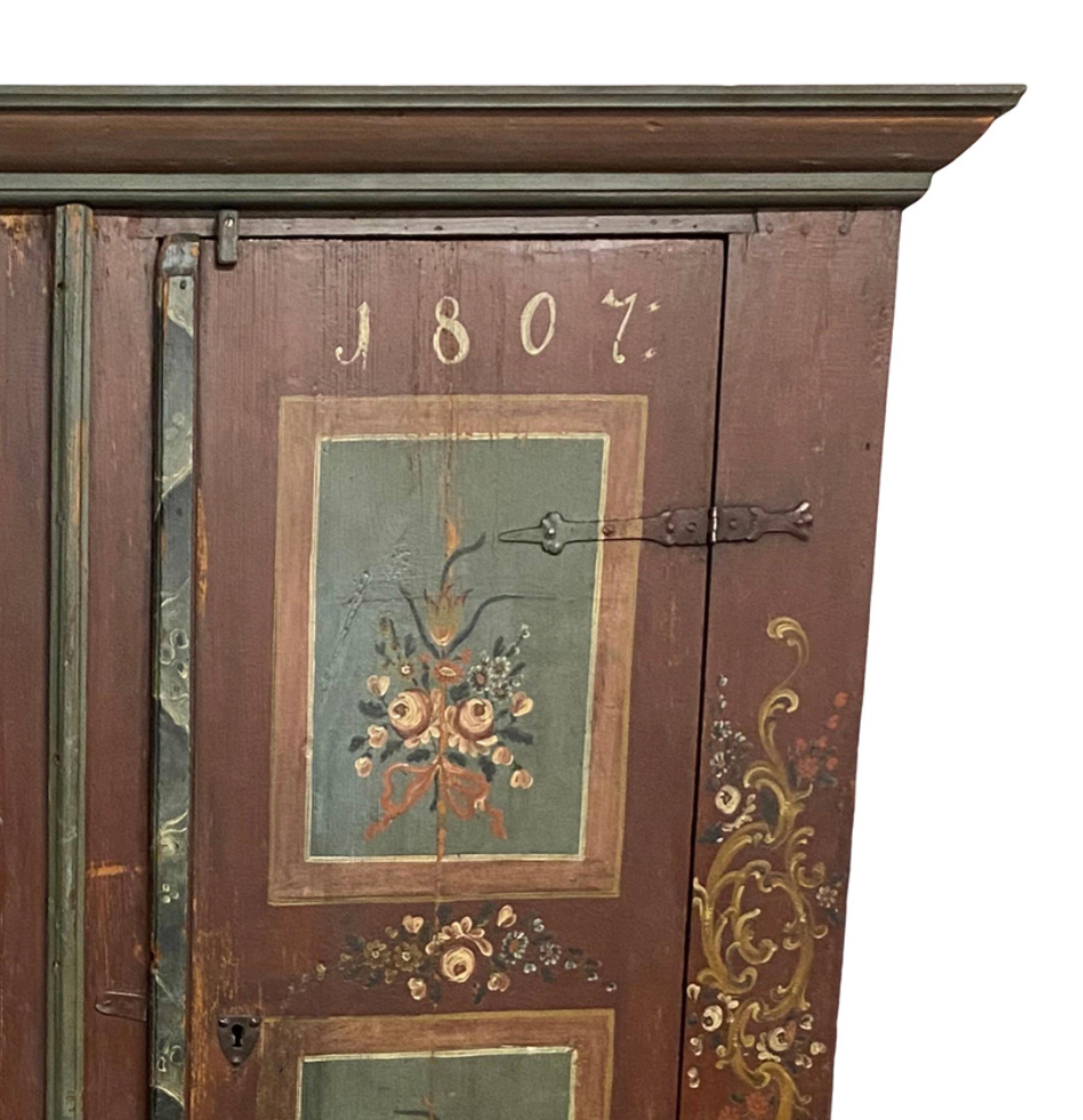 Hand painted burgundy and teal wedding armoire with initials “F.R.S.”

Dated “1807”

77.5″H x 21″D x 73″W