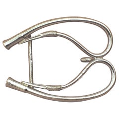 Excepcional hebilla de cinturón Hermès en forma de látigo de caballo tejano para cinturón de 24 mm