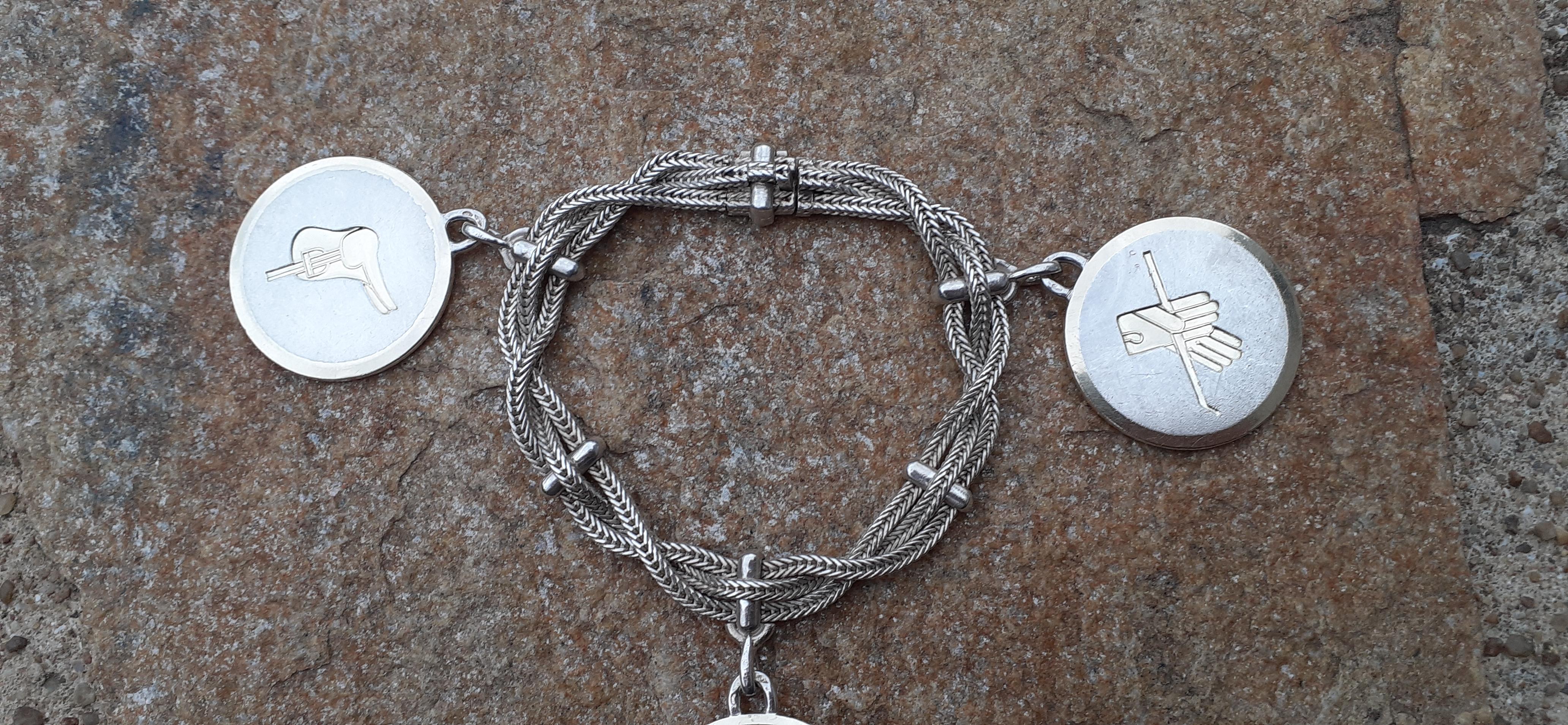 Exceptional Hermès Bracelet with Equestrian Theme Charms Horse Texas in Silver For Sale 2