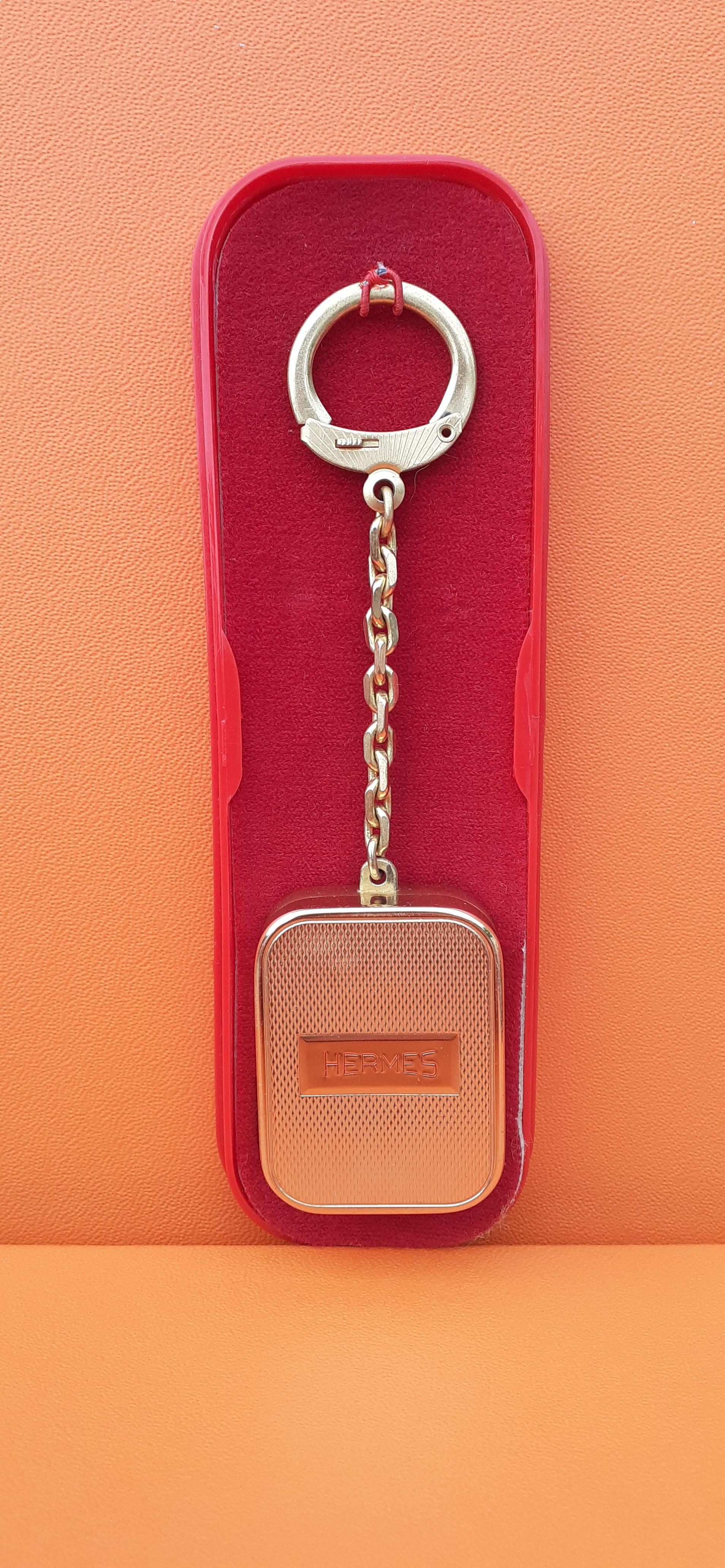 Exceptional Hermès by Reuge Sainte Croix Keychain Music Box Moulin Rouge For Sale 9