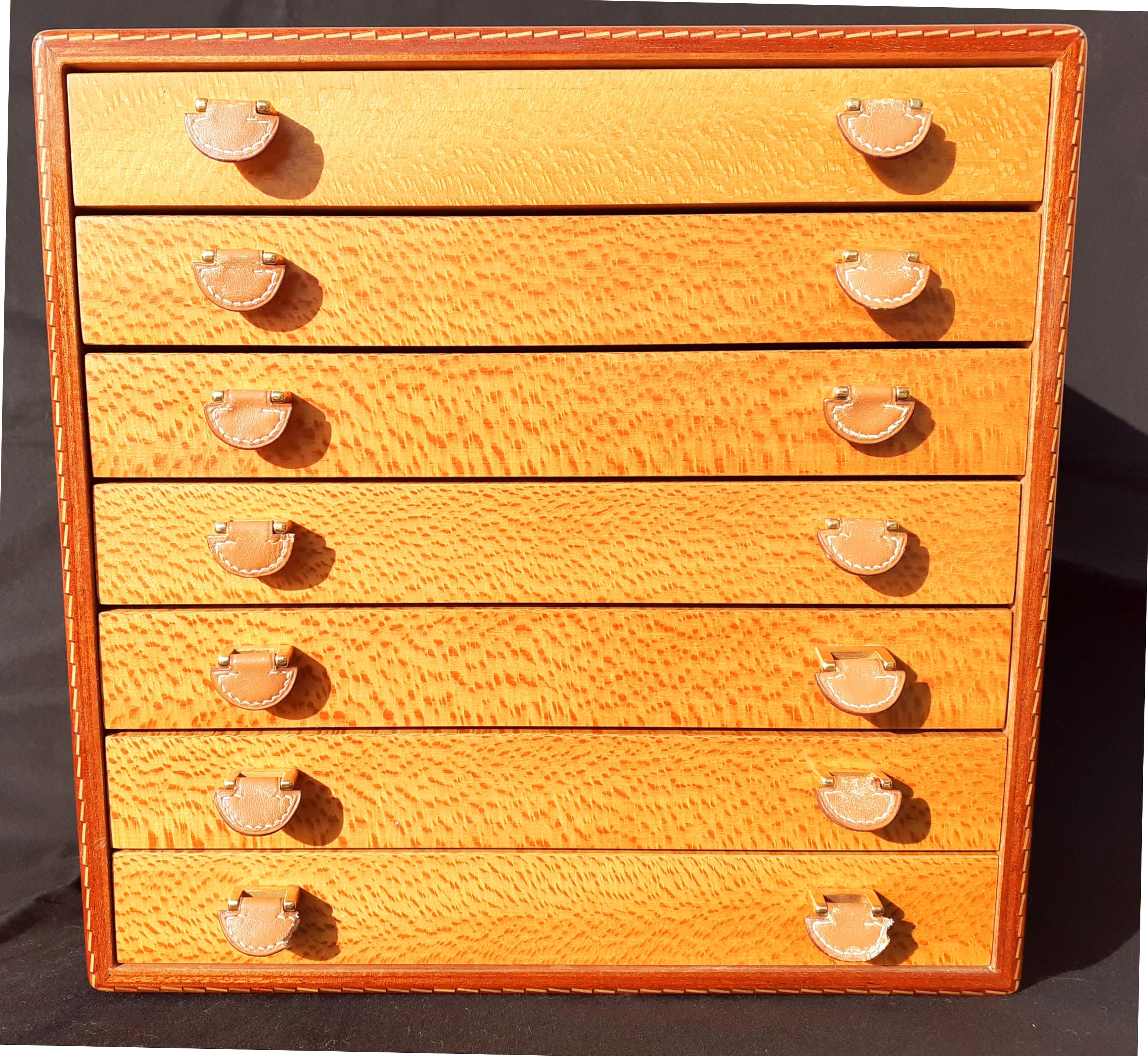 Rare and Gorgeous Authentic Hermès Chest

To store scarves, but can be used for jewelry as well

Made of wood leather handles

Coloway: Light Brown, brown, Beige/Gold Leather

Includes 7 drawers in wood

