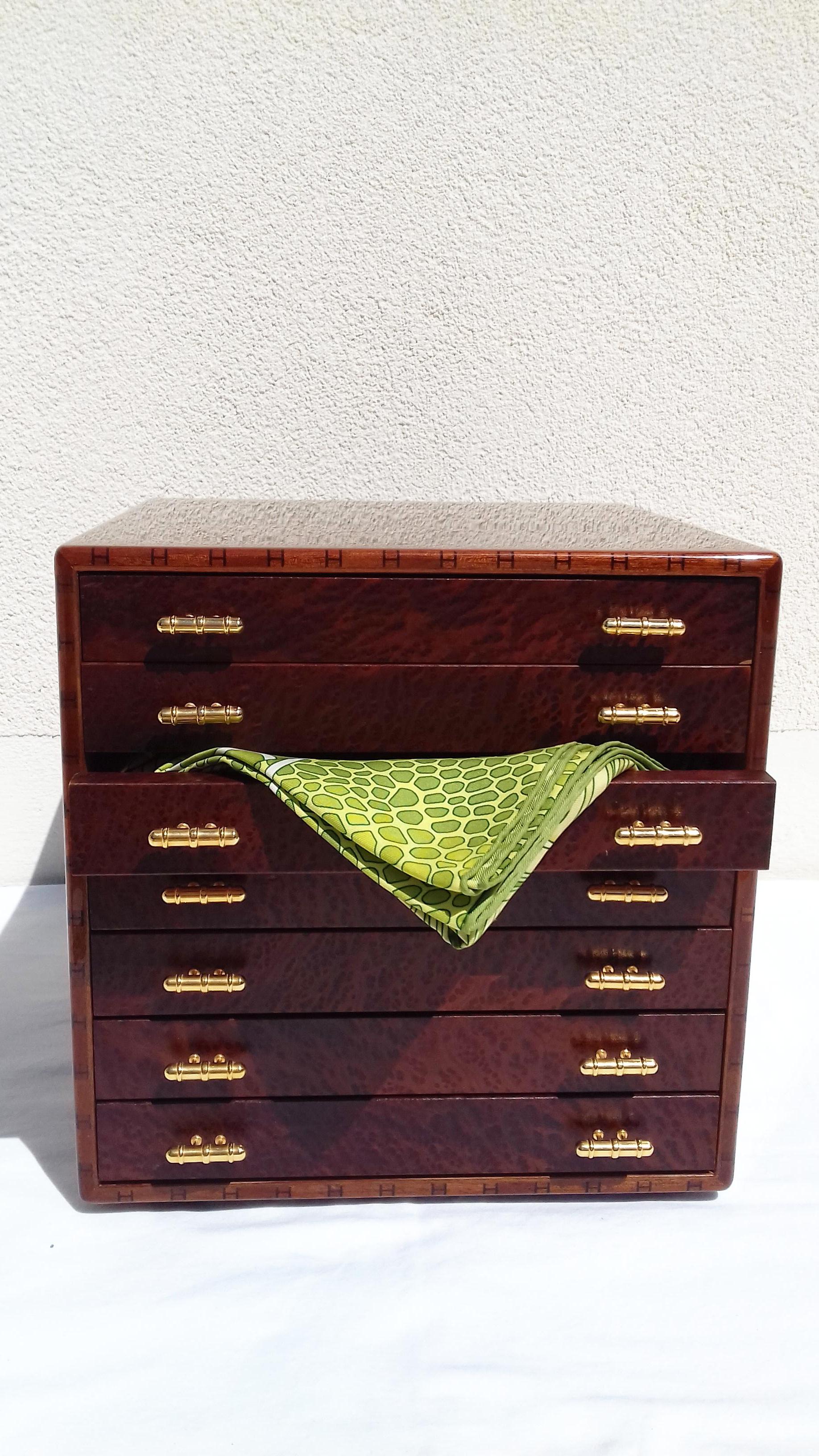 Rare and Gorgeous Authentic Hermès Drawer

To store scarves, but can be used for jewelry as well

Made of wooden and burr walnut veneer

Coloway: Brown (Pictures have been made at day light)

Includes 7 drawers in wood, each opening with 2 small