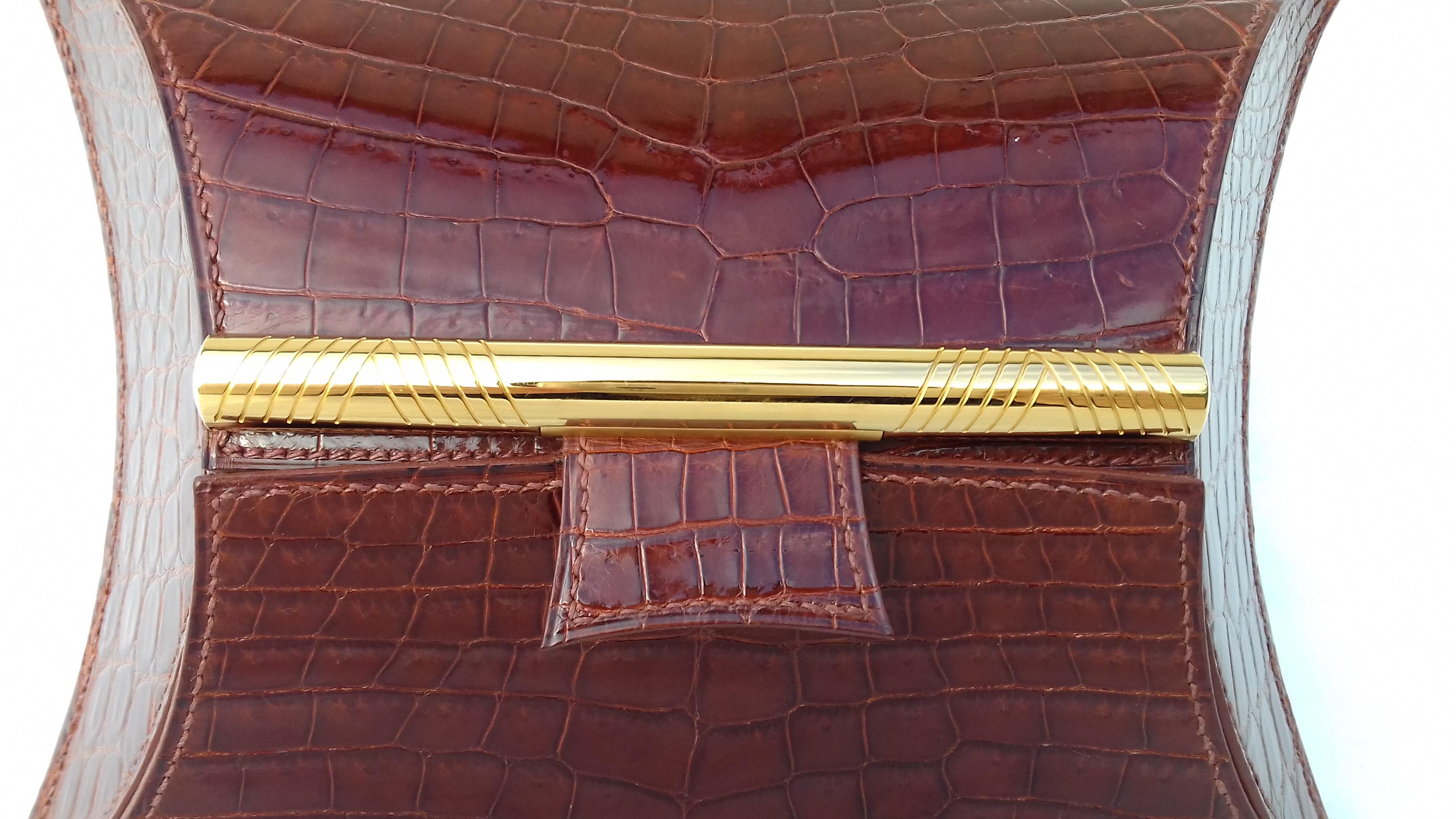 Außergewöhnliche Hermès Handtasche Geldbörse Clutch in Brown Krokodil Ghw Selten im Angebot 5