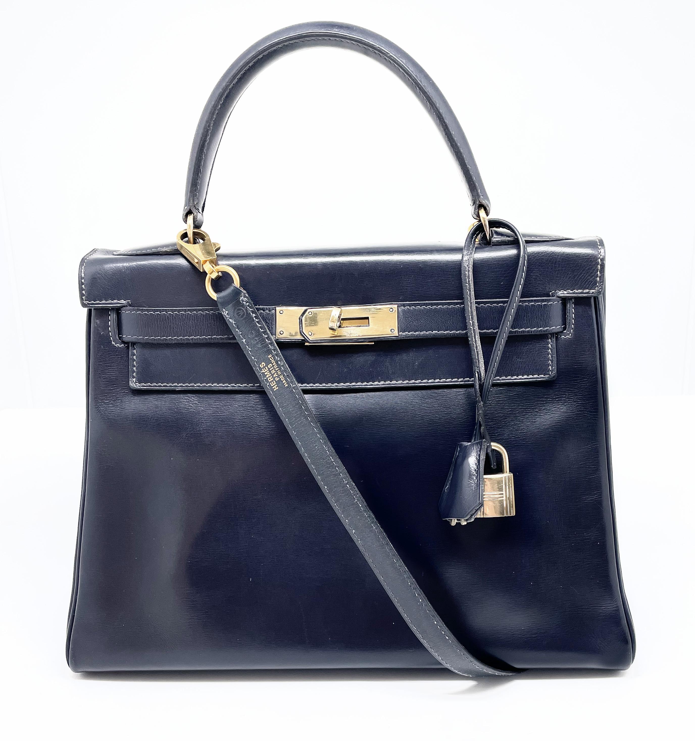 Black Exceptional Hermès Kelly bag 28 returned in navy box leather