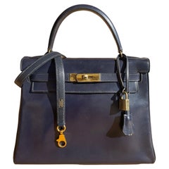 Vintage Exceptional Hermès Kelly bag 28 returned in navy box leather