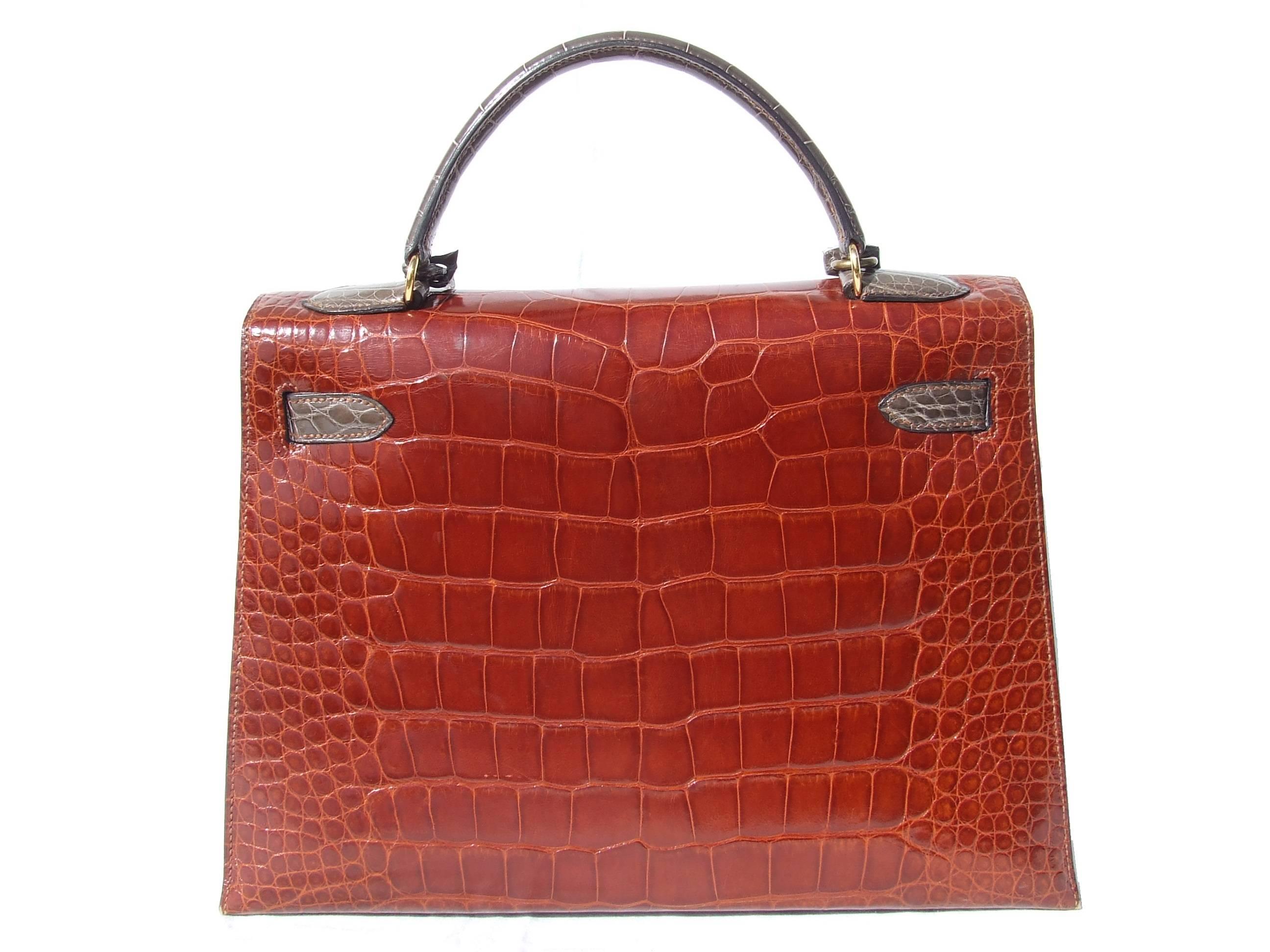 Amazingly Gorgeous Authentic Hermès Kelly Bag

Extremely Rare, this bag is a collector piece, a must-have !

Made in France

Stamp T in circle for 1990

Made of Alligator and Golden Hardware

Colorways: Front Beige / Flap and Back in Etrusque (Kind
