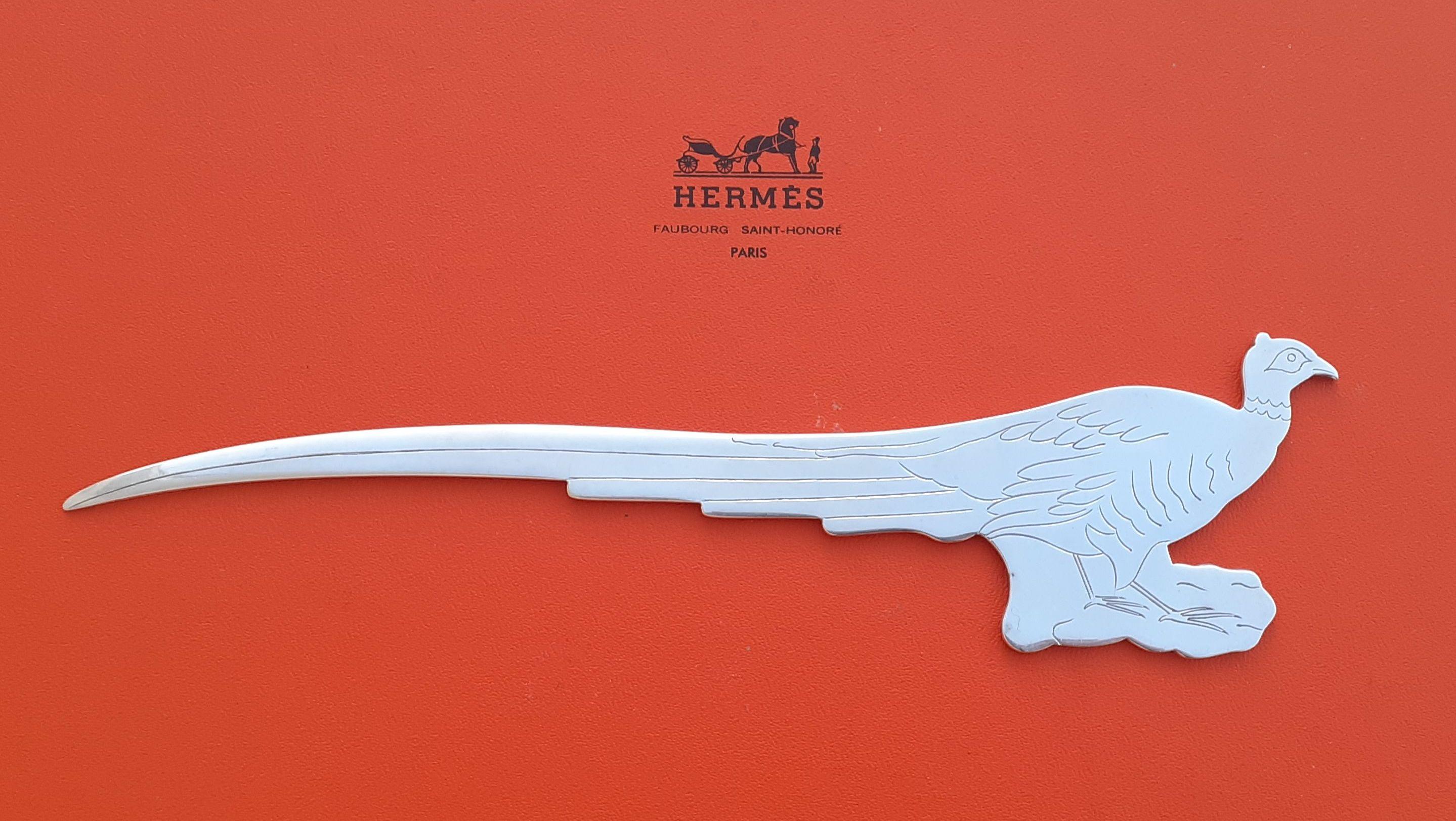Extremely Rare Authentic Hermès Letter Opener

Absolutely stunning, a rare collector item

Pheasant shaped

Vintage Item 

Made of metal (non precious)

Colorway: silvery

