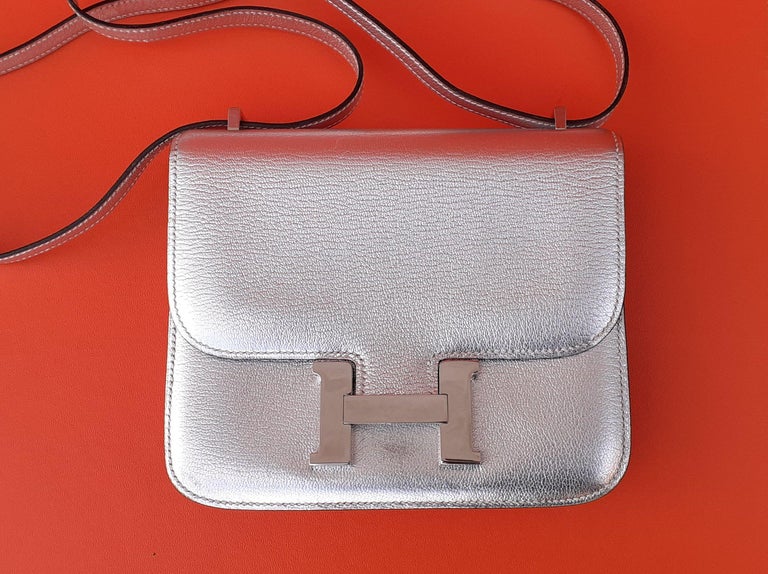 Exceptional Hermès Mini Constance Metallic Silver Chevre Leather Phw 18 cm  For Sale at 1stDibs
