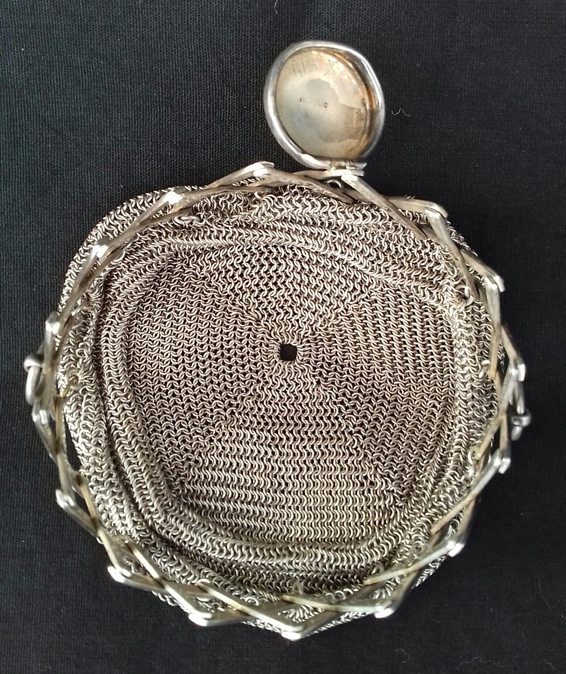 Extremely Rare Authentic Hermès Coin Purse 

The purse is made of fluid meshes, enhanced by a retractable opening, which closes by a lid. 2 small rings on the sides

Made of Silver 835 (83,5% of Silver)

