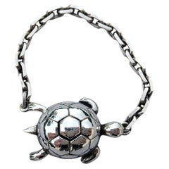Exceptionnel porte-clés ou breloque tortue Secret Mechansim d'Hermès en Silver