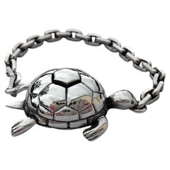 Exceptionnel porte-clés ou breloque tortue Secret Mechansim d'Hermès en Silver