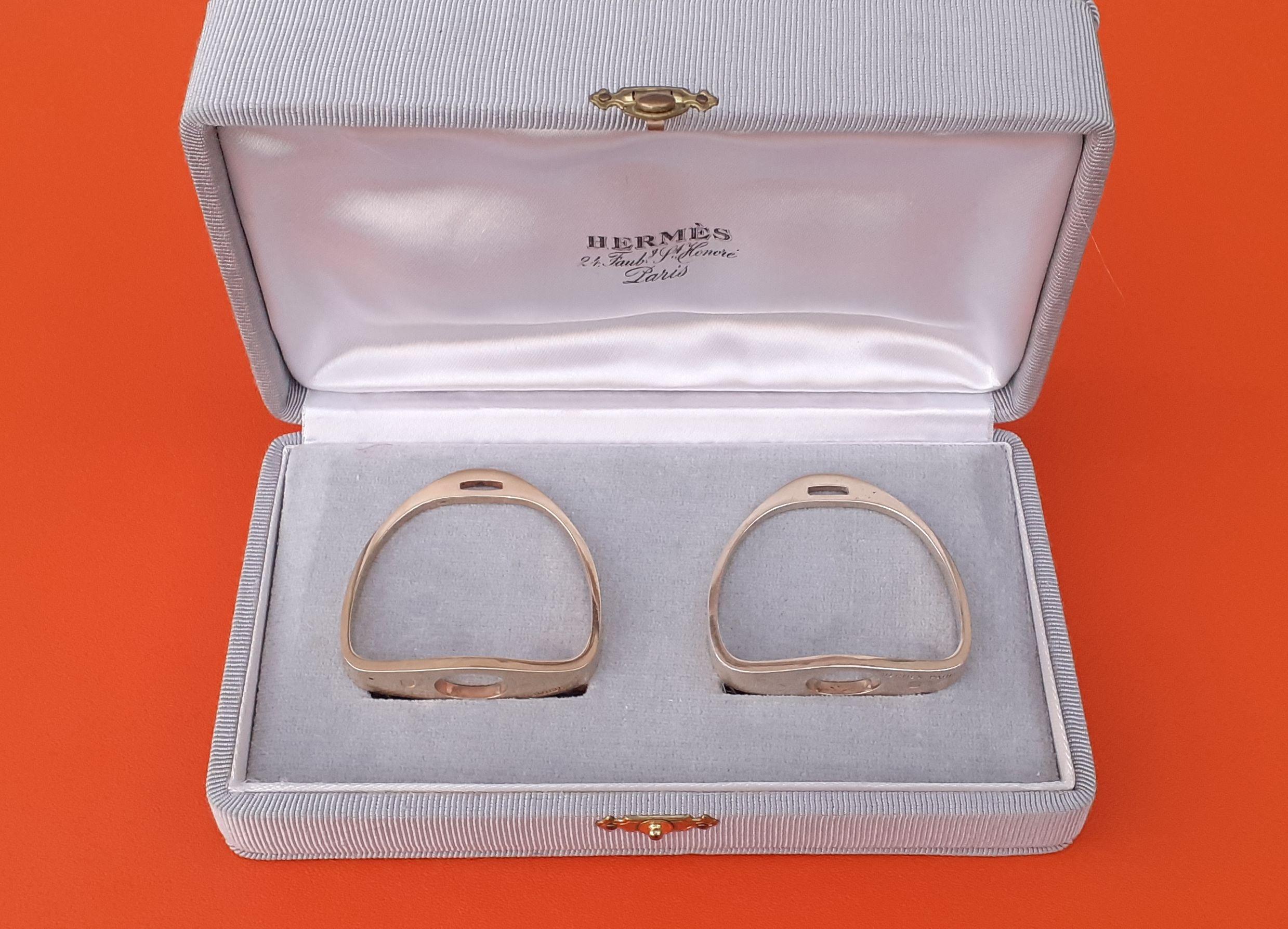 Gorgeous and Rare Authentic Hermès Napkin Rings

Set of 2 

In shape of Stirrups, horse riding theme

Vintage items

Made of silver-gilt (silver covered with gold) / vermeil

Colorway: golden


