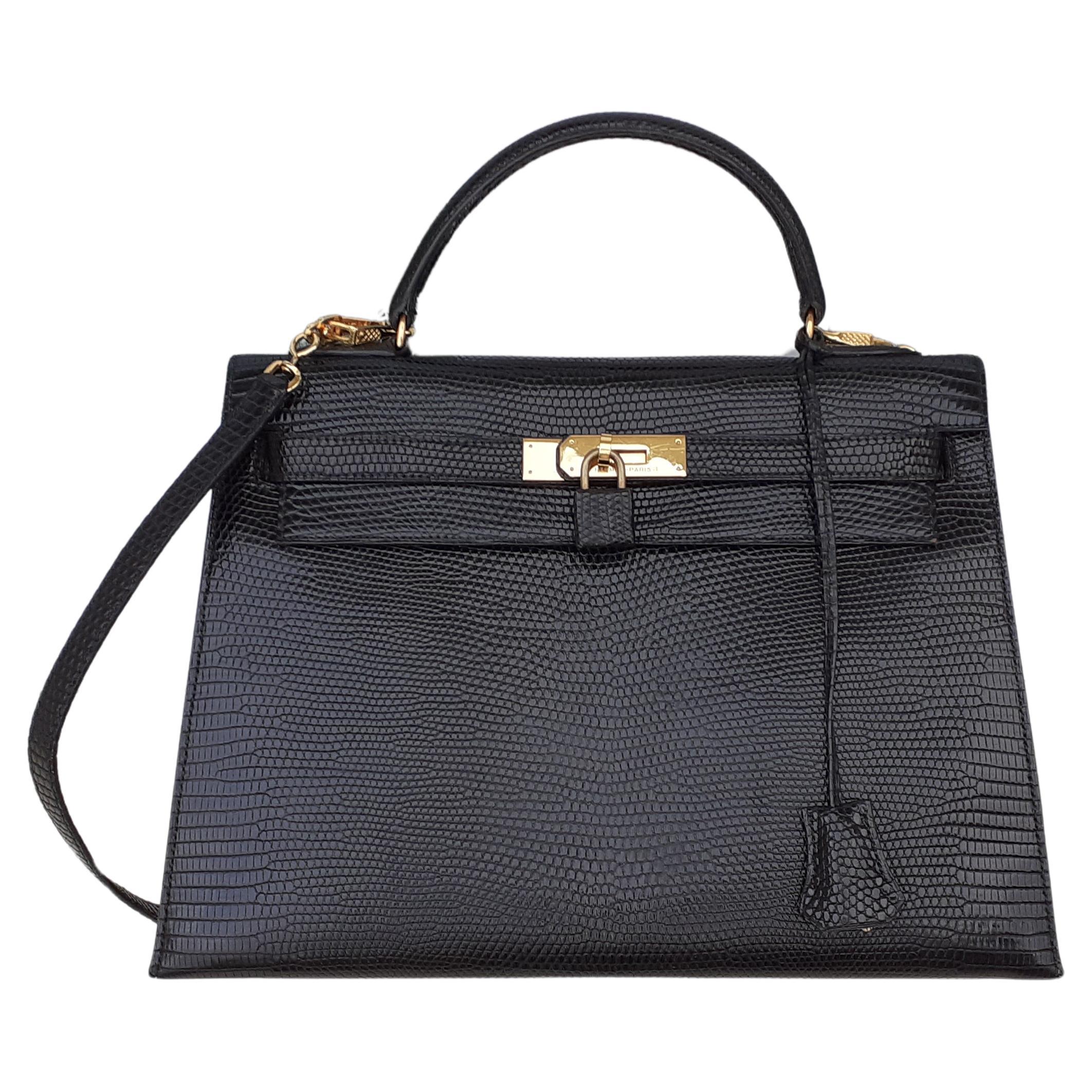 Exceptionnel Hermès Sellier Kelly Bag Lézard noir et or Hdw RARE en vente