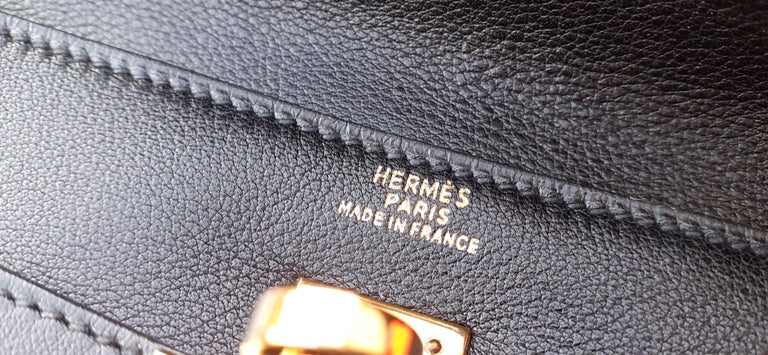 1stdibs Exclusive Hermès Kelly Pochette Metallic Bronze Chèvre Ruthenium For  Sale at 1stDibs
