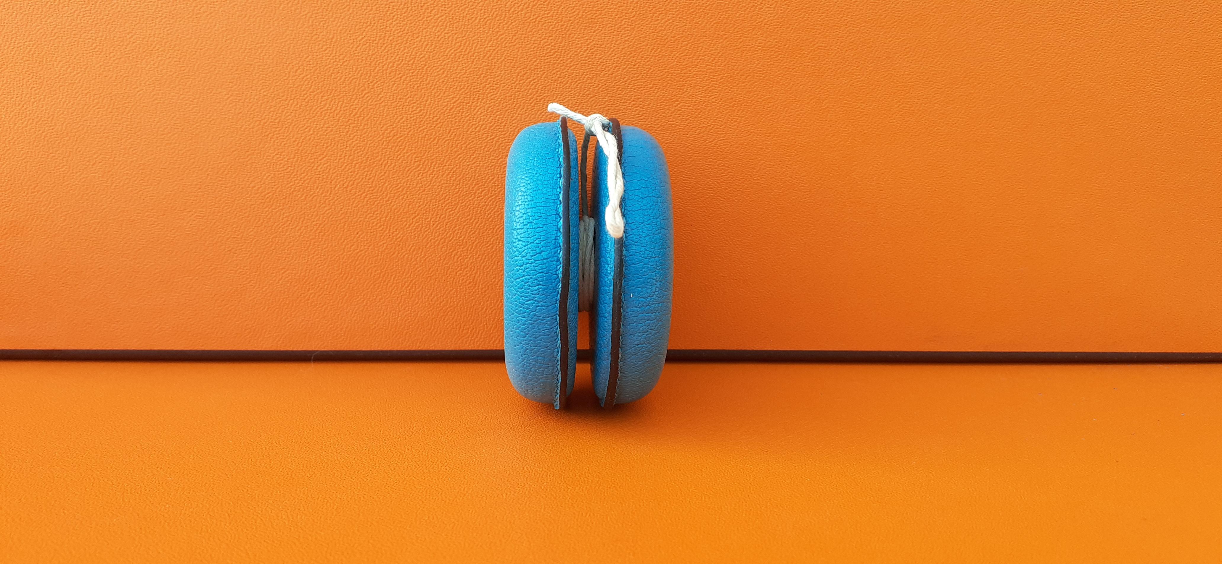 Rare Authentic Hermès Yoyo

Made of Grained Leather and White Rope

Colorway: Turquoise blue

