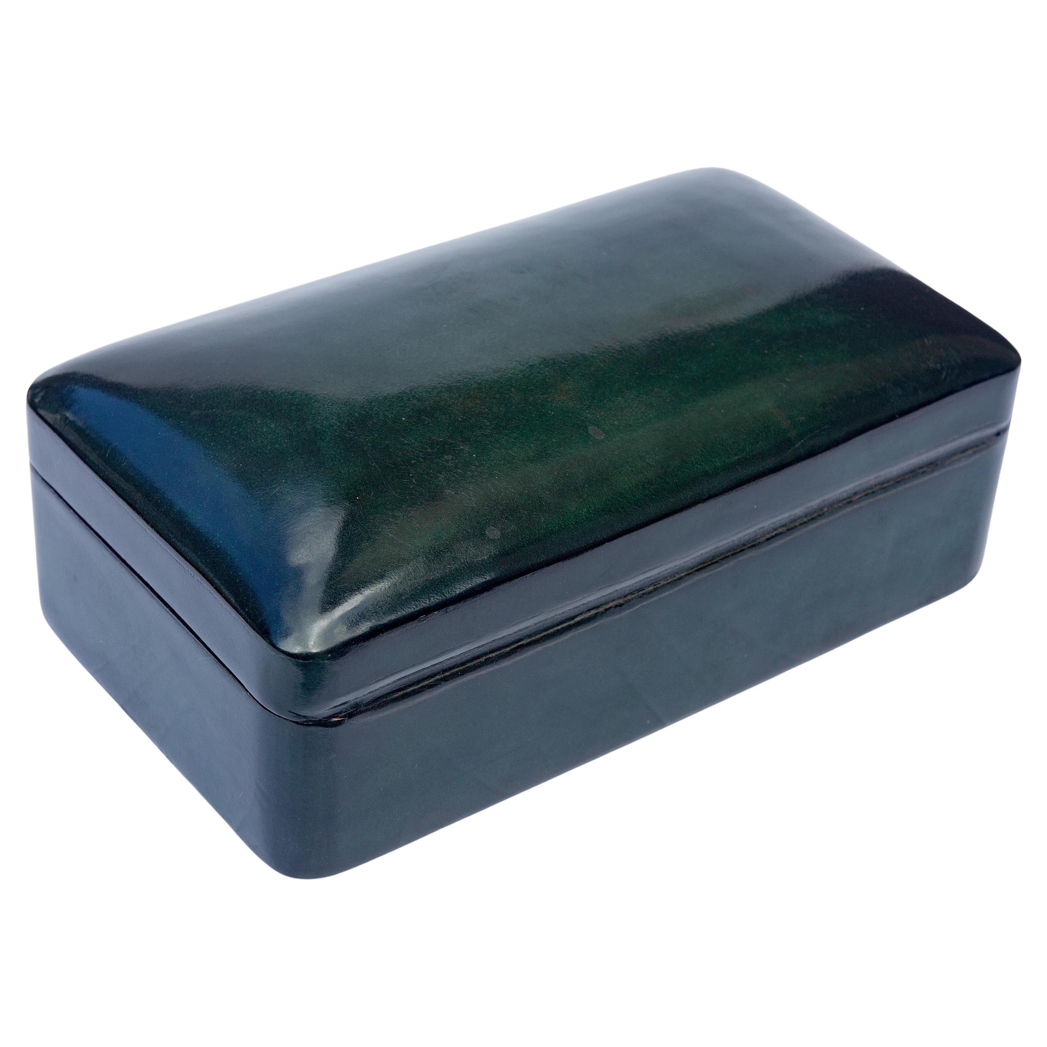 Italian lustrous emerald green  leather box by Bruscoli Leather. Absolute finest quality.  Signed. Circa 1960's.
 Pelletteria Bruscoli, a historic Florentine company founded in 1881 that specializes in the craft production of artistic leather items,