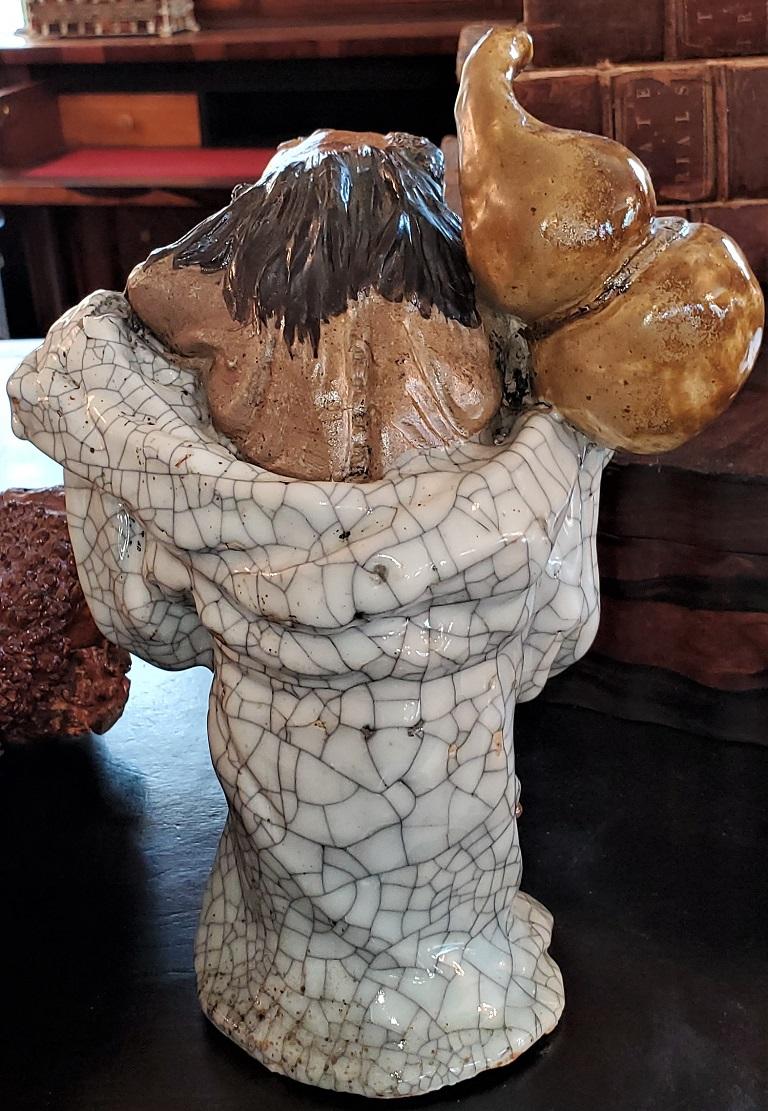 Hand-Crafted Exceptional Japanese Ceramic Figure in Knotted Wooden Stand