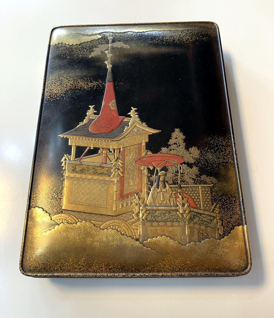An exceptional Japanese suzuribako (writing box) in maki-e decoration circa 18th century Edo period. This is one of the most spectacular pieces of Japanese lacquer art offered by our gallery. The decorative theme is Gion Matsuri Festival that