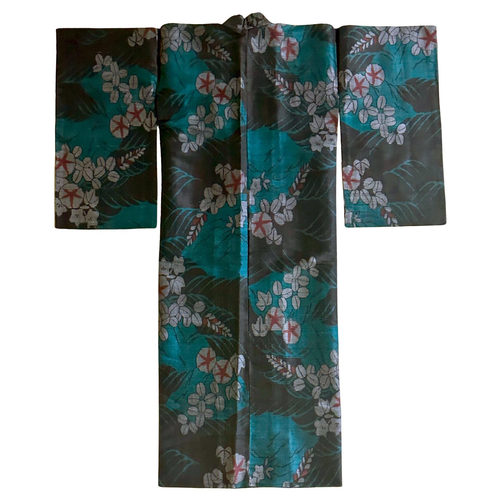 A super fine Japanese summer unlined (Hitoe) Kimono made with a soft Asa fiber blended with silk. The garment was hand-stitched and dated to circa 1930-50s Showa period. It is hard to identify the exact type of fibers used, possibly a fine linen or