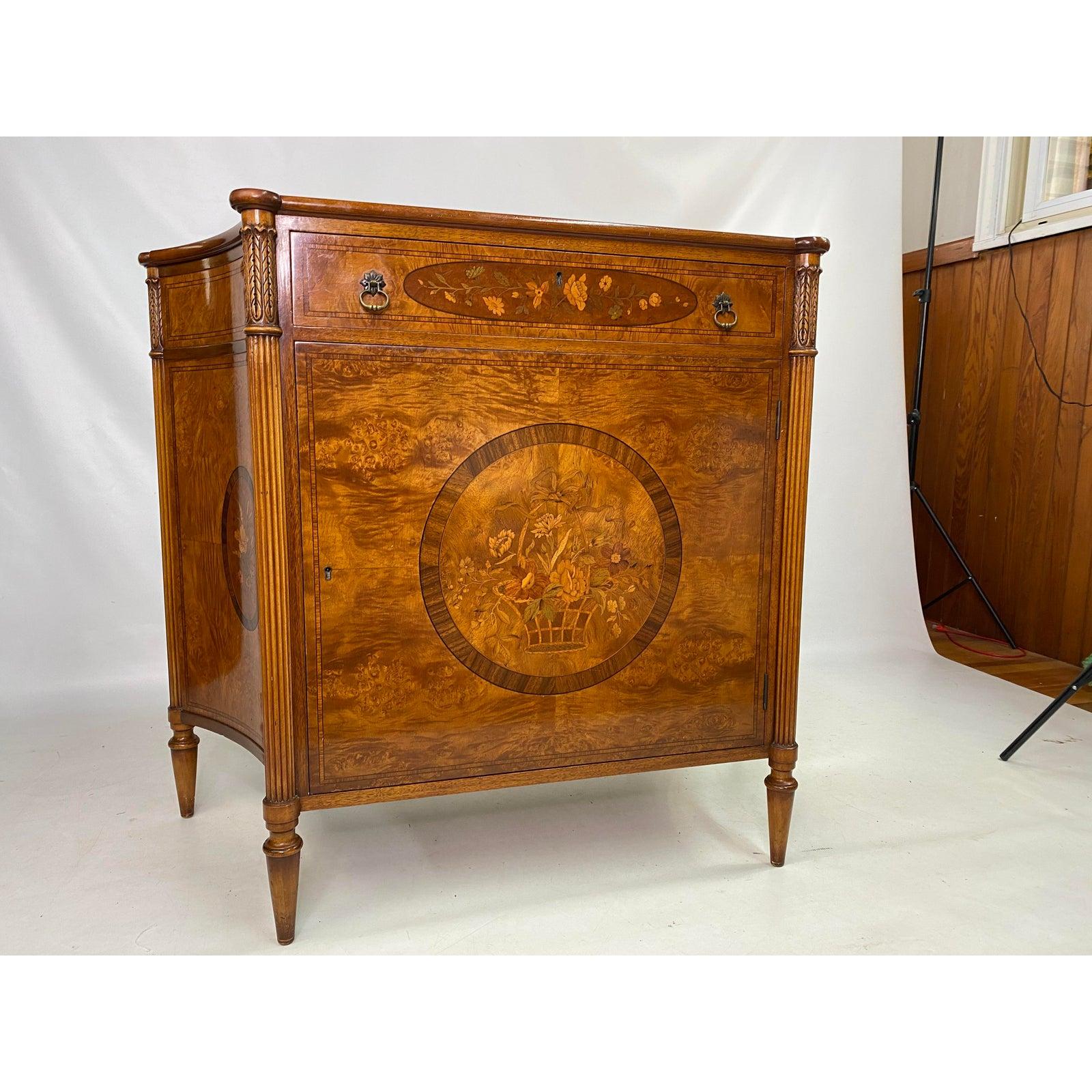 Exceptional Joseph Gerte Co. Regency-style inlaid mahogany and burl veneer side swell cabinet.