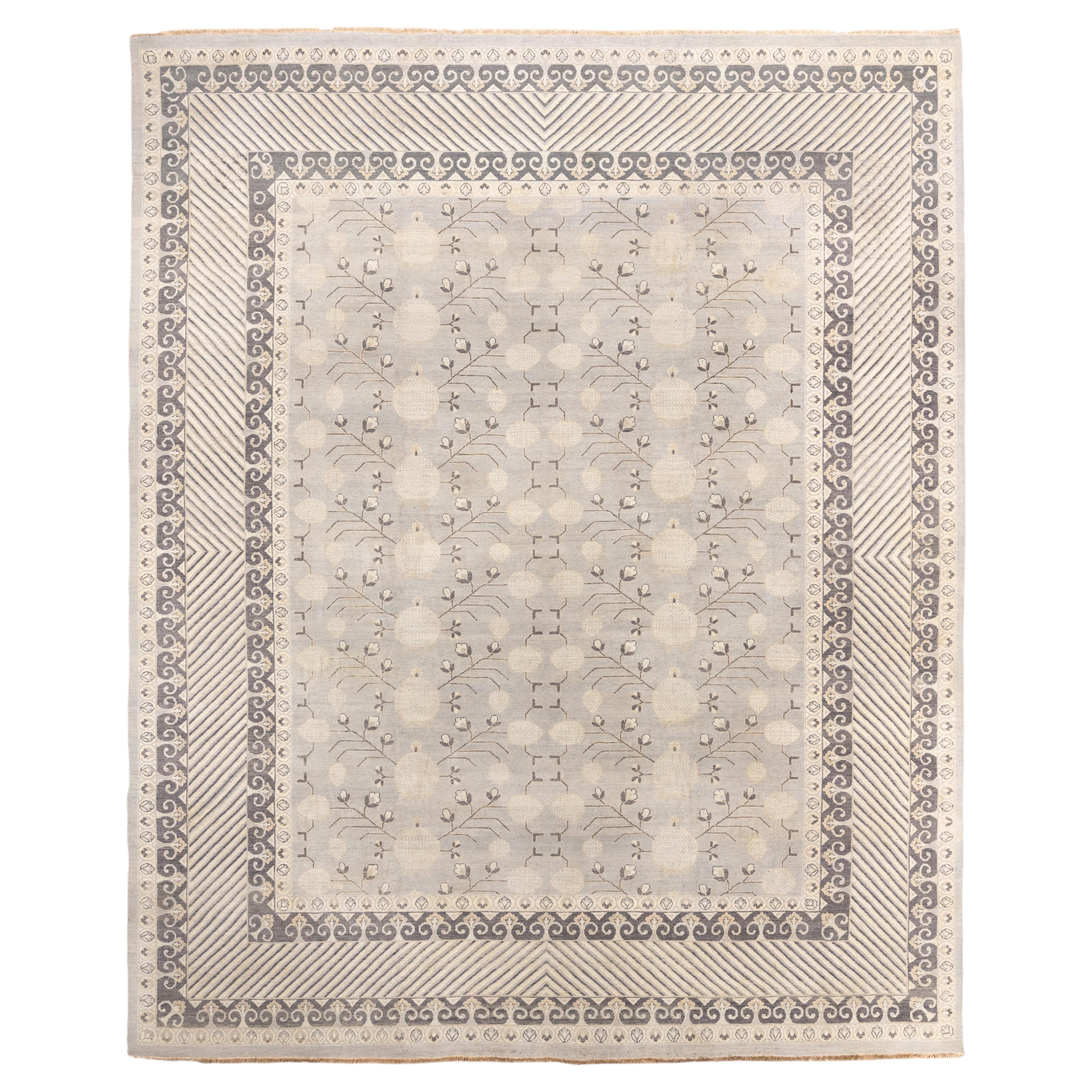 Exceptional Khotan Carpet with Soft Gray Field and Botanical Design For Sale