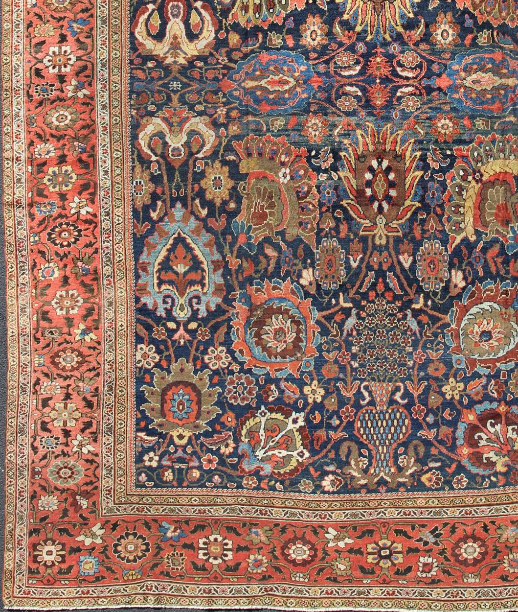 Exceptional Large Antique Sultanabad Rug in Midnight Blue and Coral Red. Keivan Woven Arts / rug M14-0305, country of origin / type: Iran / Sultanabad, circa 1900. 
Measure: 13.1 x 17.1.
This exceptional antique Sultanabad showcases a marvelous