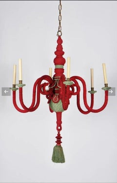 Exceptional large fashion chandeliers, entirely covered with trimmings.
