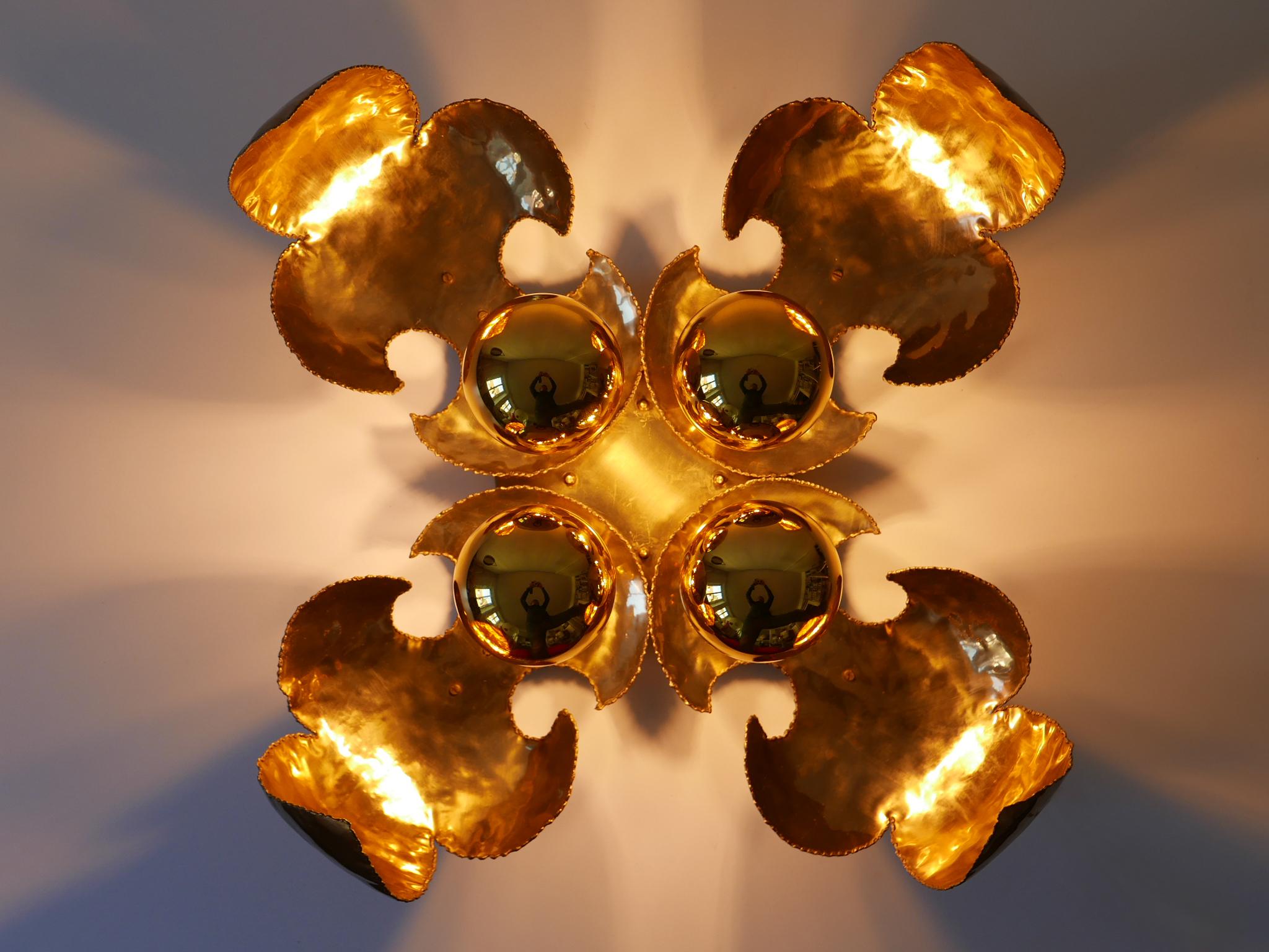 Extremely rare, large and highly decorative brutalist Mid-Century Modern brass sconces or ceiling fixtures. Designed & manufactured probably by Maison Jansen, France, 1960s.

A total of four identical sconces / ceiling fixtures available. Price per