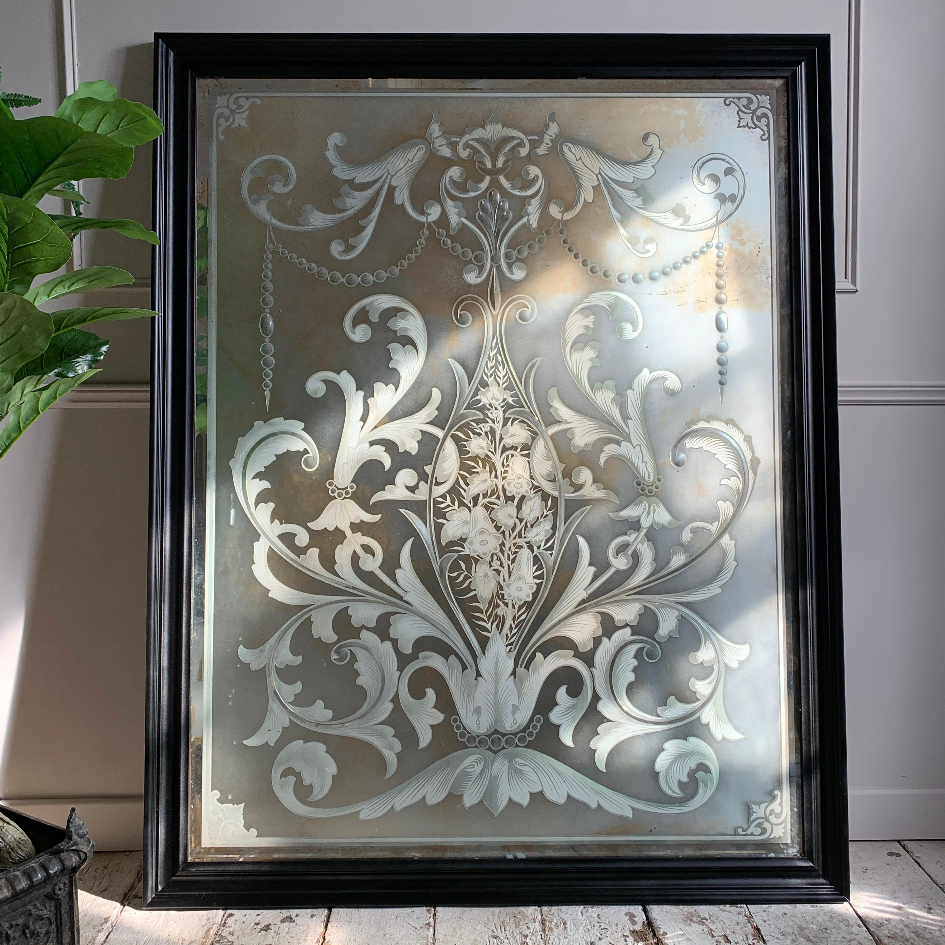 This is an absolutely beautiful and very large scale Victorian pub mirror, removed from the saloon of a London public house, the etched and beveled plate is profuse with scrolls, swags, acanthus leaves, floral designs and garland decoration.

We