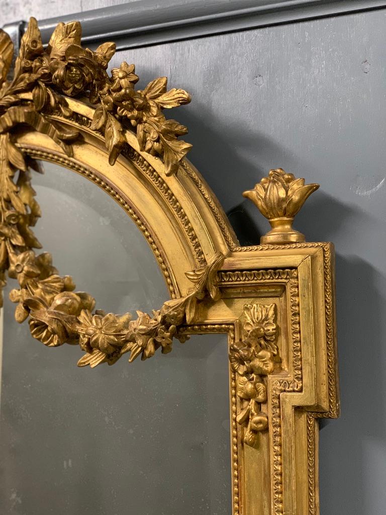 Giltwood Exceptional Late 19th Century French Louis XVI Style Gilt Bevelled Mirror For Sale