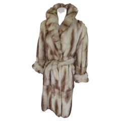 Eccezionale cappotto lungo con cintura in pelliccia