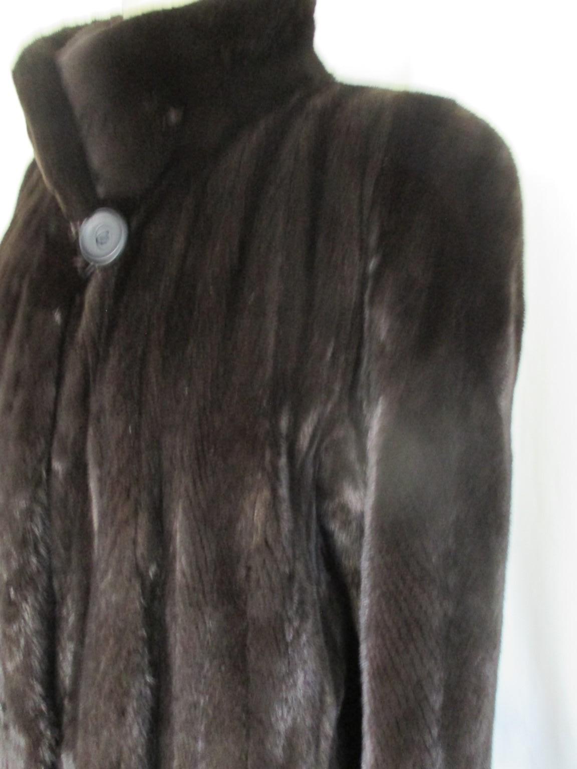 This brown coat is made of soft quality sheared mink fur.

We offer more luxury fur items, view our front store

Details:
Very soft and light weight, high quality mink
with 1 closing button, 3 closing hooks, 
2 pockets 
These coats are rare to