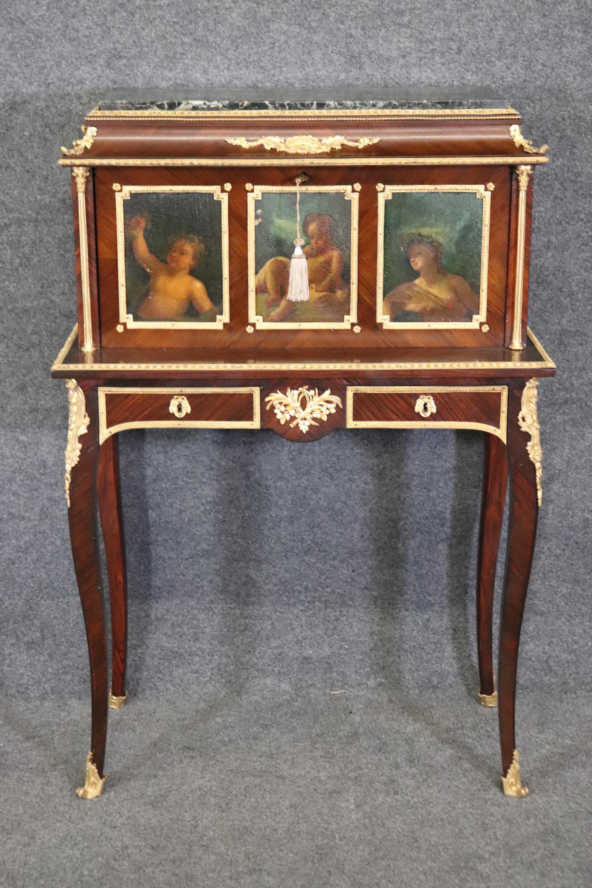 Dimensions: Height: 42 3/4 in Width: 29 3/4 in Depth: 16 1/2 in 

This exceptional Befort Jeune Louis XV style 19th century marble top mahogany sceretaire desk with bronze mounts is something to be seen! If you look at the photos provided, you can