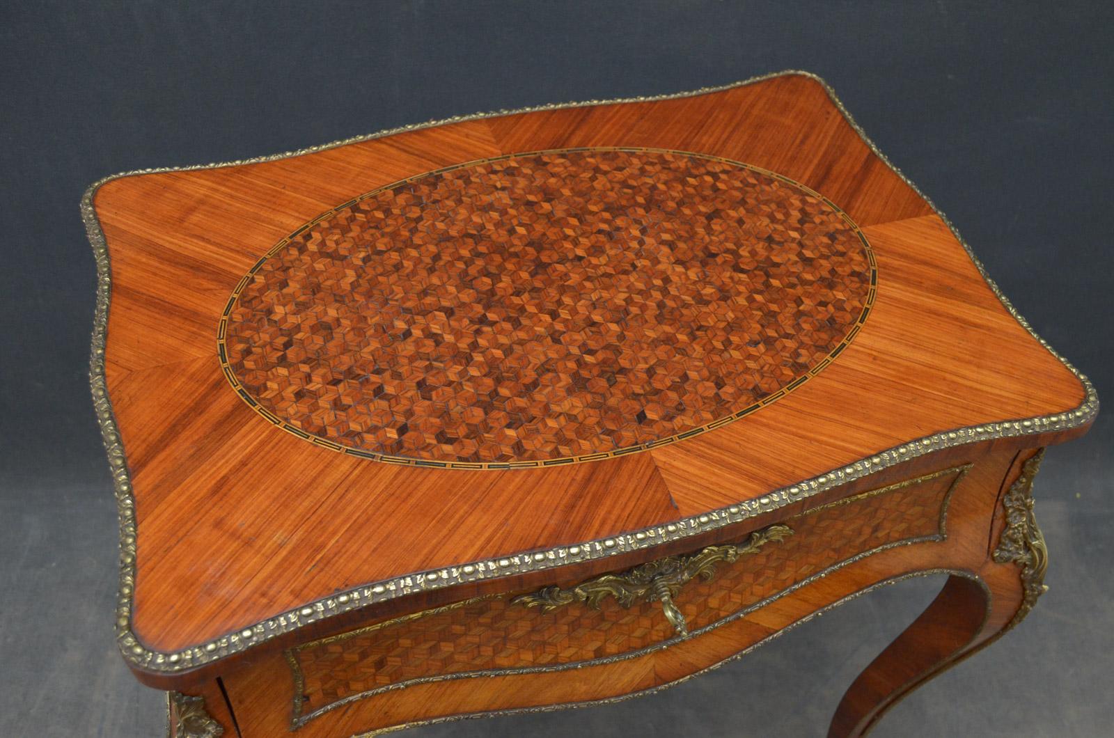 Sn4037, stunning continental kingwood dressing table of serpentine design, having tulipwood and rosewood parquetry inlaid panel and brass decorated edge to hinged top which opens to reveal original mirror and finely engraved hinges and lock above a