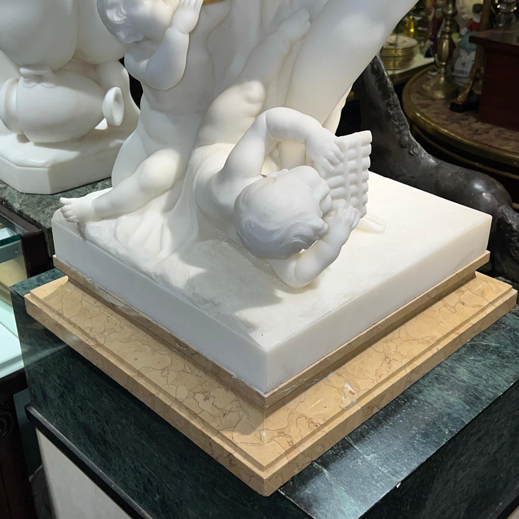 Hand-Carved Exceptional Marble Statue of Nude Female with Cherubs by Luca Madrassi For Sale