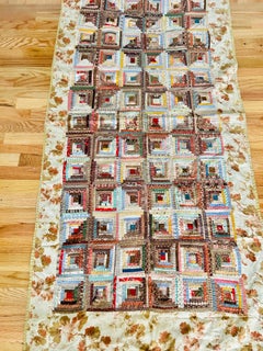 Exceptional Mid-19th Century Sunshine & Shadows Log Cabin Quilt, c. 1855–1870
