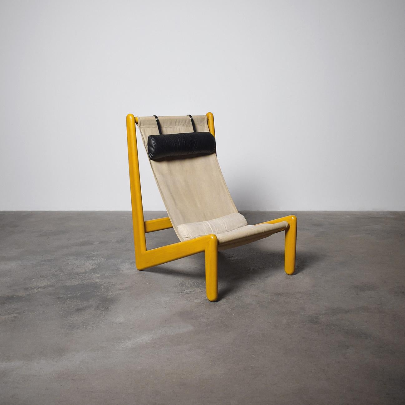 This exceptional mid-century lounge chair is a true statement piece, blending bold design with comfort and craftsmanship. Its striking sculptural form is accentuated by a vibrant yellow hue, making it a focal point in any interior. The floating