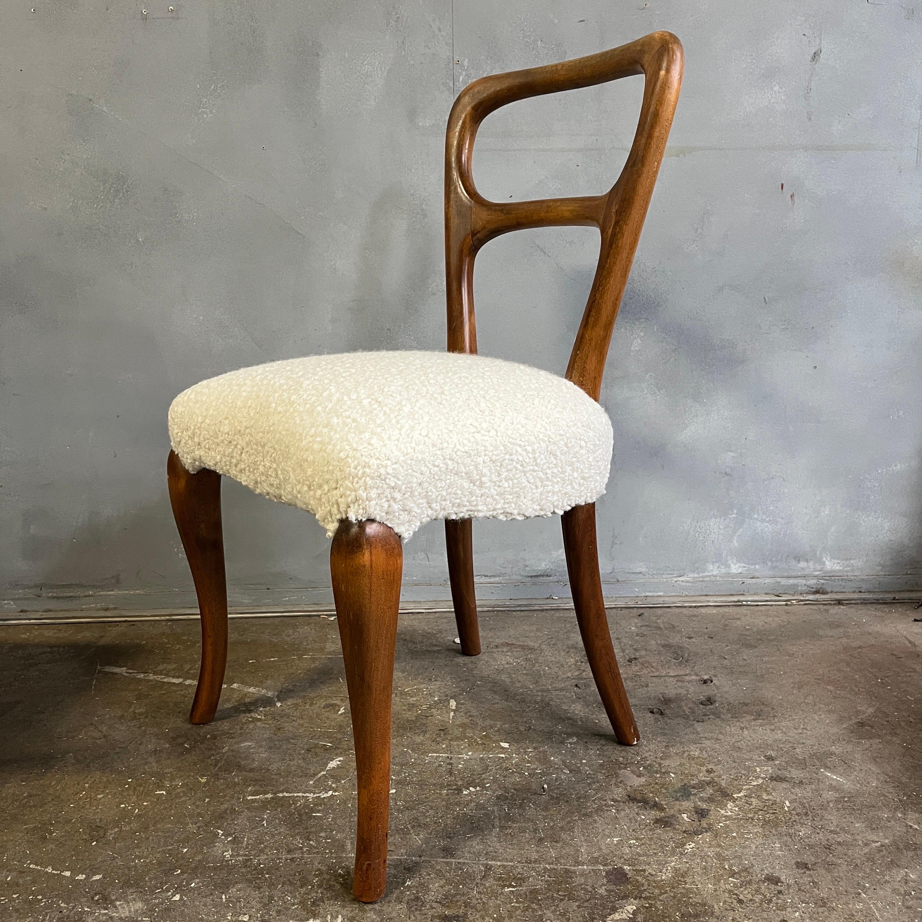 Spectacular build and quality in this set of four curved ballon back dining chairs. Having a perfect mix of Classical Victorian and Mid-Century style. By construction and style likely made in the 1940's early 50’s. Jean Royère style. Incredible