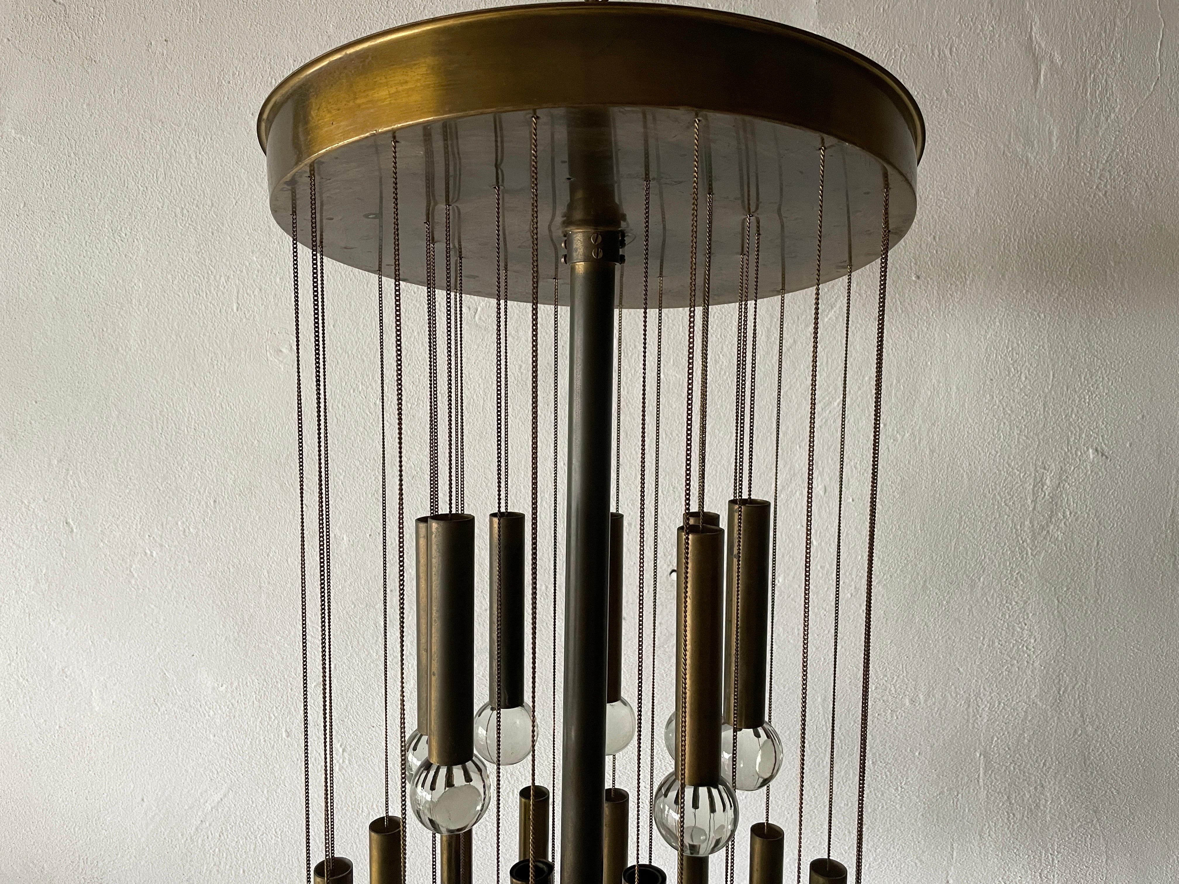 Exceptional Multiple Tubes with Glass Balls Brass Chandelier, 1960s, Italy

Lampshade is in good condition
 
This lamp works with 8 x E14 light bulb. 
Wired and suitable to use with 220V and 110V for all countries.

Measurements: 

Height: