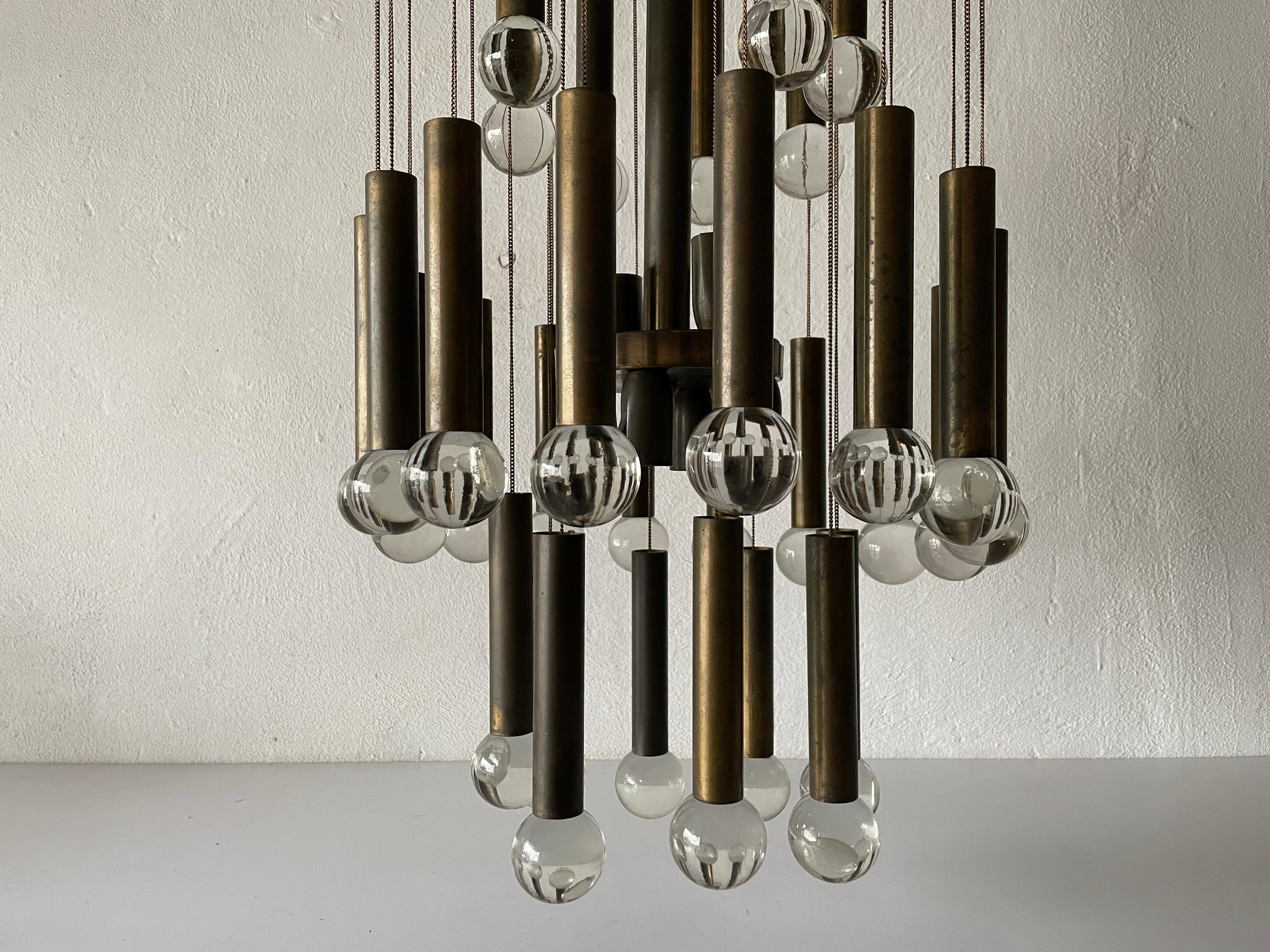 Mid-Century Modern Exceptional Multiple Tubes with Glass Balls Brass Chandelier, 1960s, Italy For Sale