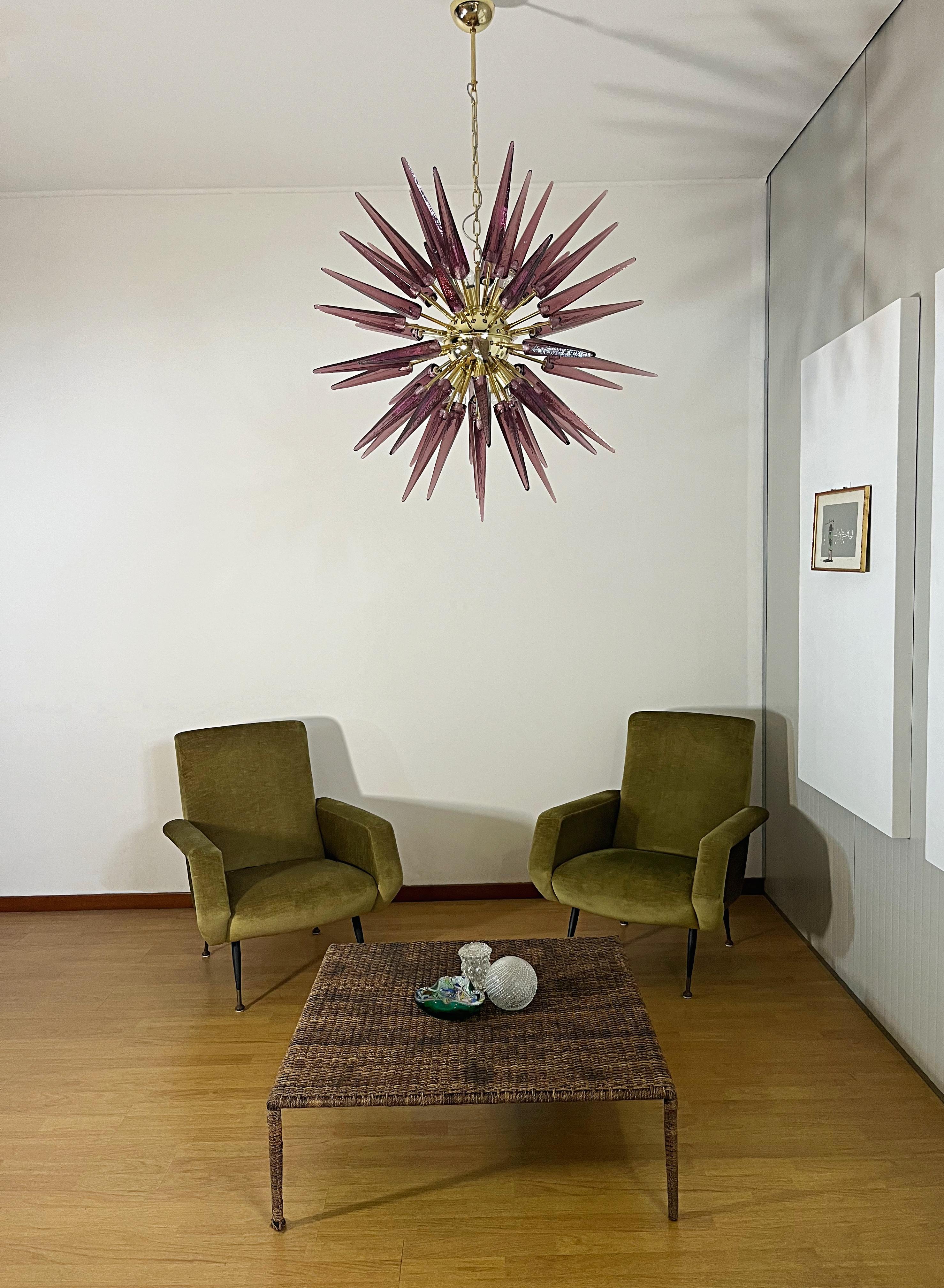 Italian Sputnik chandelier in brass plated metal frame, 51 rare amethyst glass tips. Murano blown glass in a traditional way. 10 light points.
Period: late xx century
Dimensions: 55.10 inches (140 cm) height with chain; 37.40 inches (95 cm) height