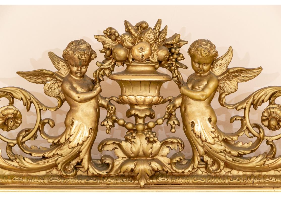 Bois doré Exceptionnel Miroir Napoléon III en bois sculpté et doré en vente