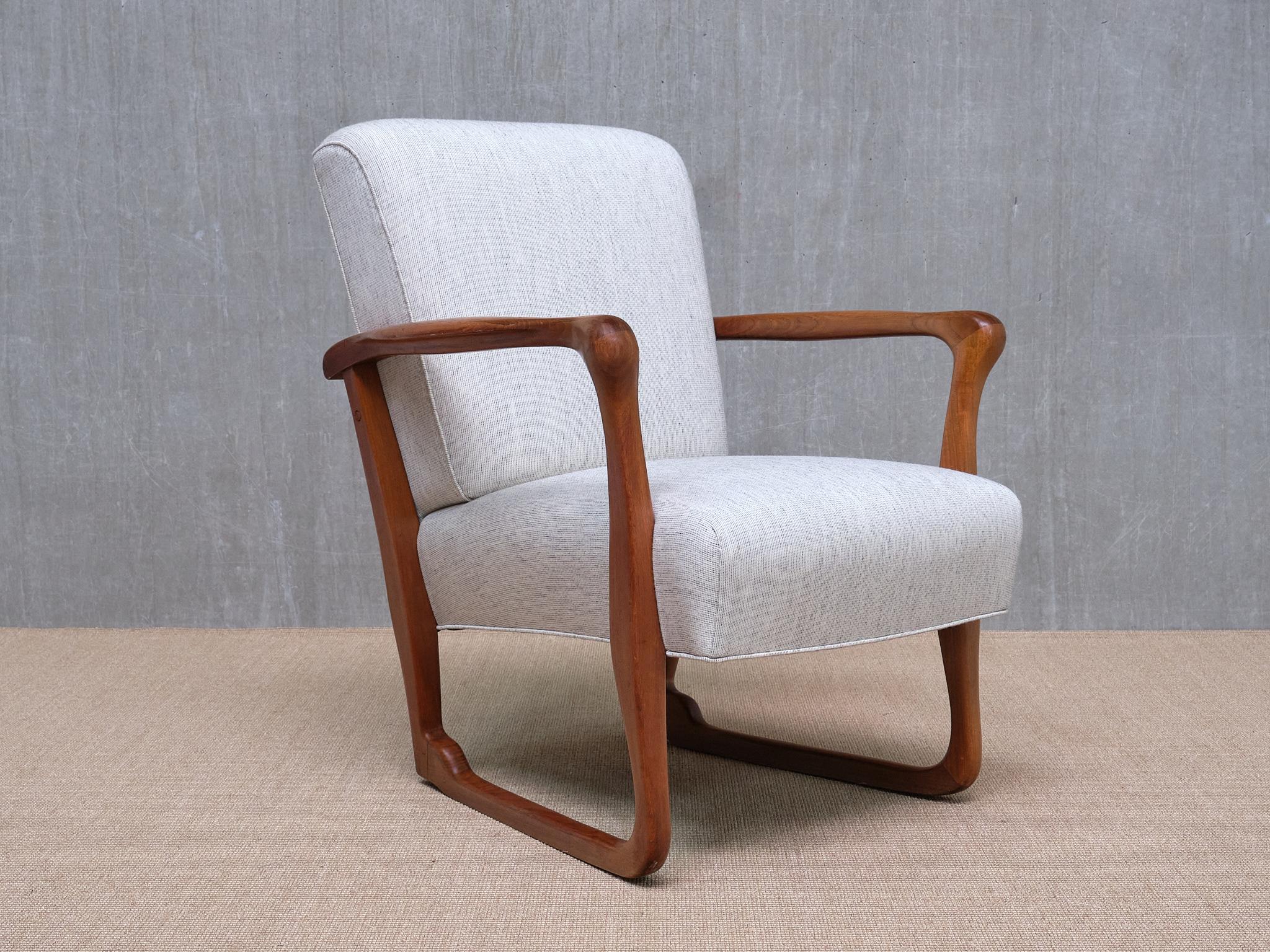 This exceptionally rare armchair was designed by the Danish architect Ole Jacobsen. It was produced by C.B. Hansen Etabl., a renowned Danish cabinetmaker and manufacturer known for its high quality production and for supplying to the Danish