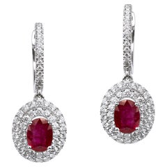 Exceptional oval natural ruby diamond dangle earrings, halo diamond in 18k gold
