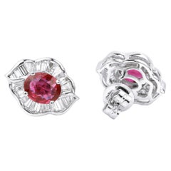 Exceptional oval natural ruby diamond stud earrings, halo diamond in 18k gold