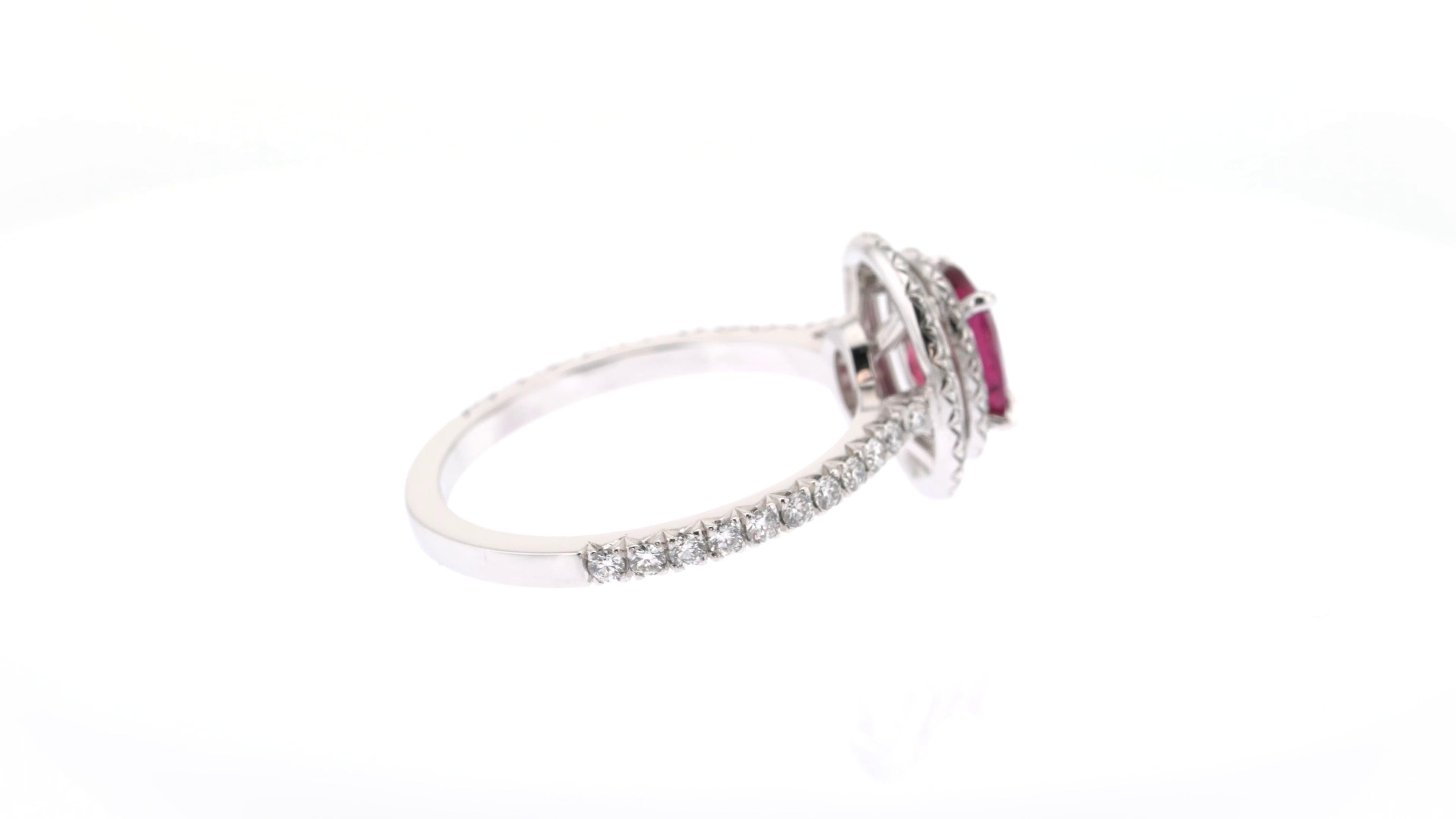 1.18 Carats Oval Ruby and White Diamonds Double Halo Ring In New Condition For Sale In London, GB