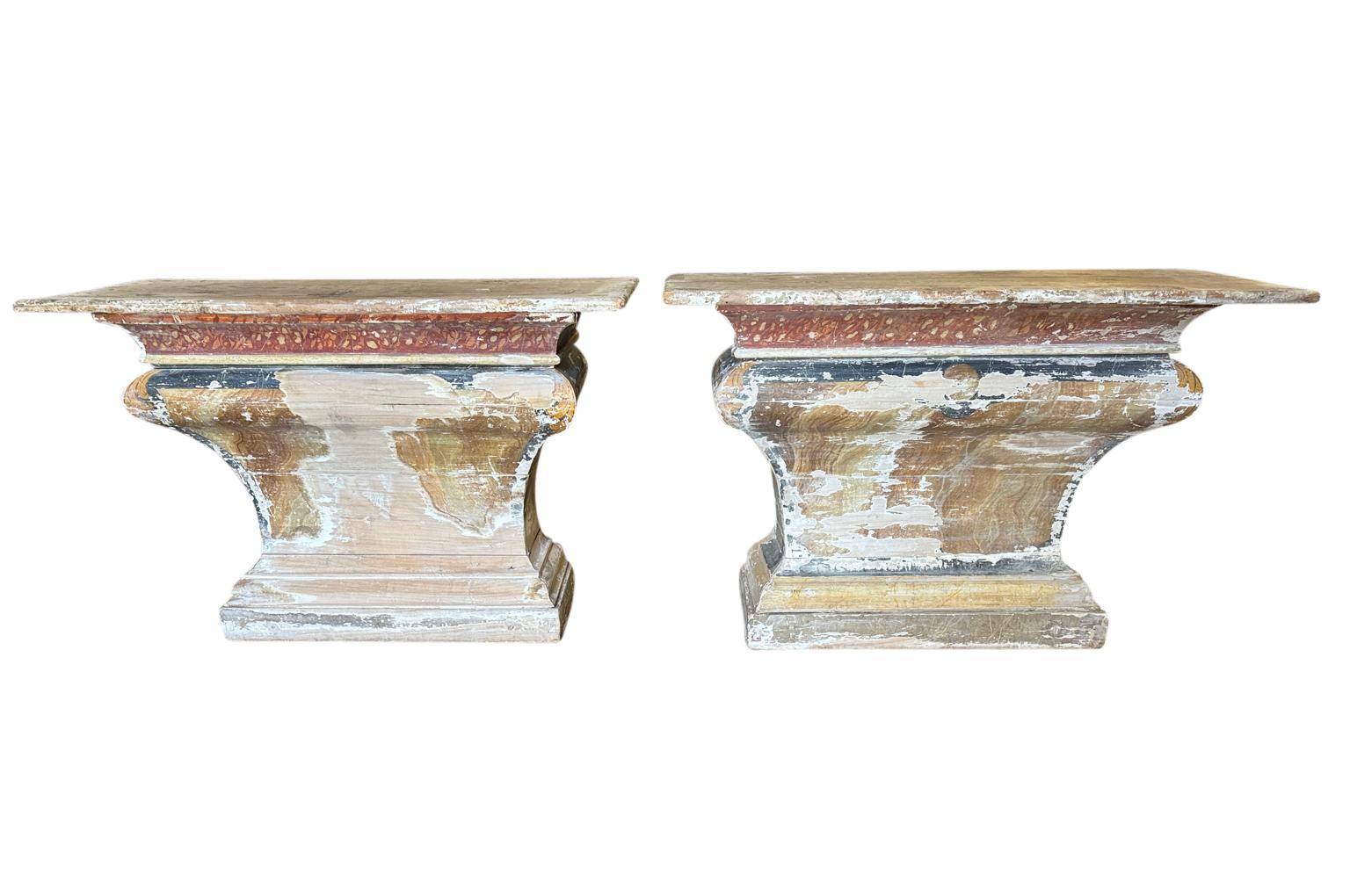 An exceptional and rare pair of 18th century Altars from the Veneto region of Italy. Beautifully constructed from painted wood with a wonderfully sculpted shape. Outstanding patina. Perfect to flank a grand fireplace or passage way. 