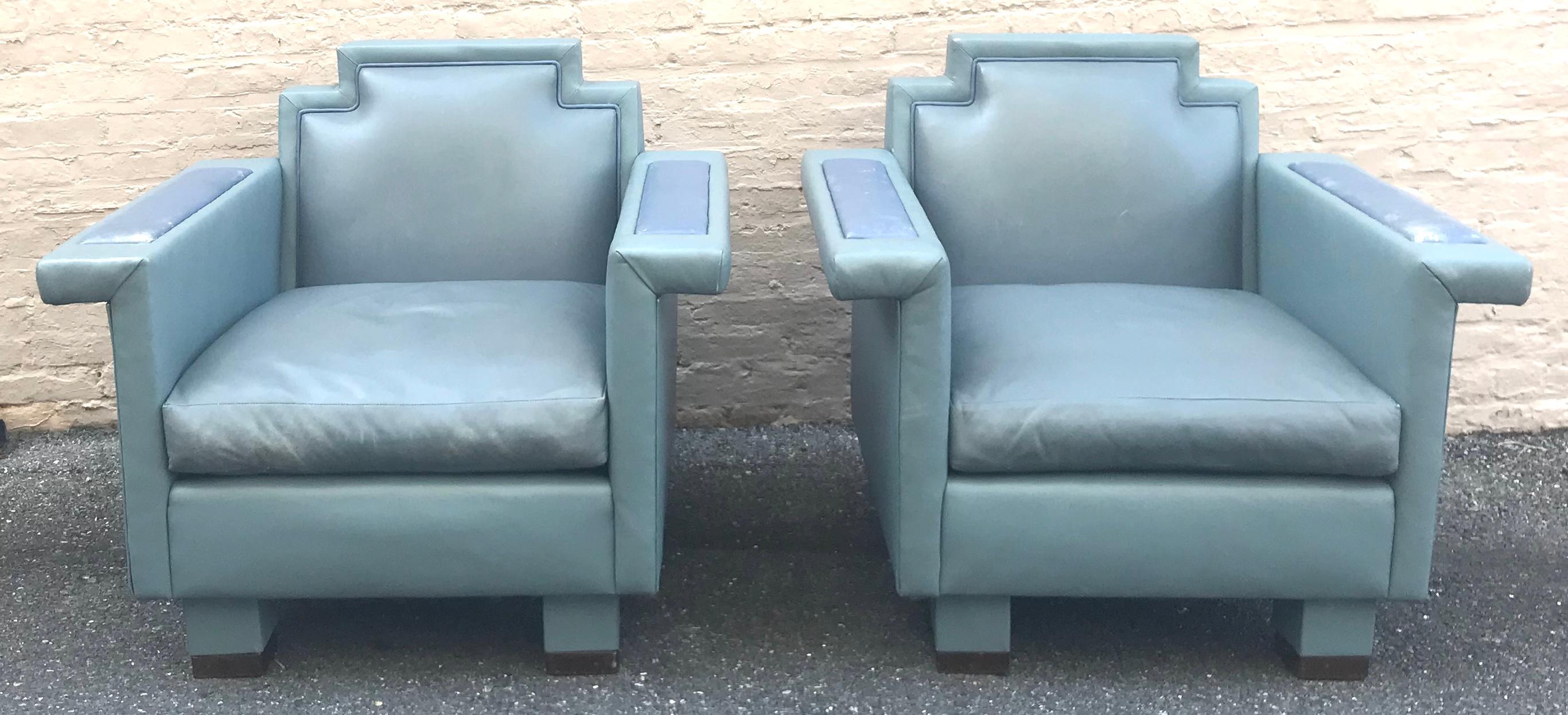 Exceptional pair of blue-gray custom-made leather lounge chairs designed by Ronn Jaffe, circa 1985. These have a wonderful Postmodern, slightly Memphis vibe to them, with unparalleled craftsmanship and quality. They’re also extremely comfortable!