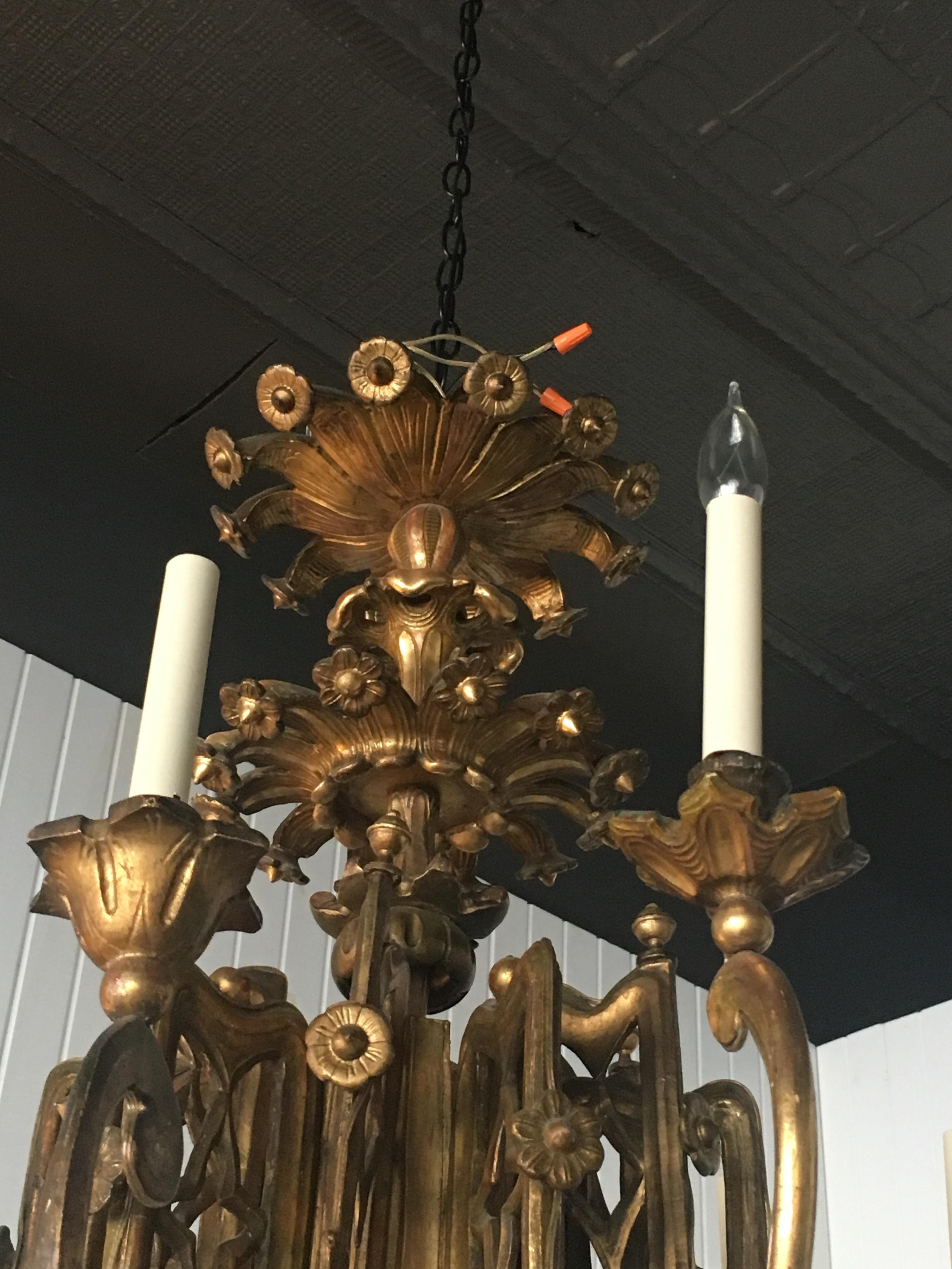 Exceptional pair of 19th century English giltwood twelve-light chandeliers. Great form and scale. Priced per chandelier.